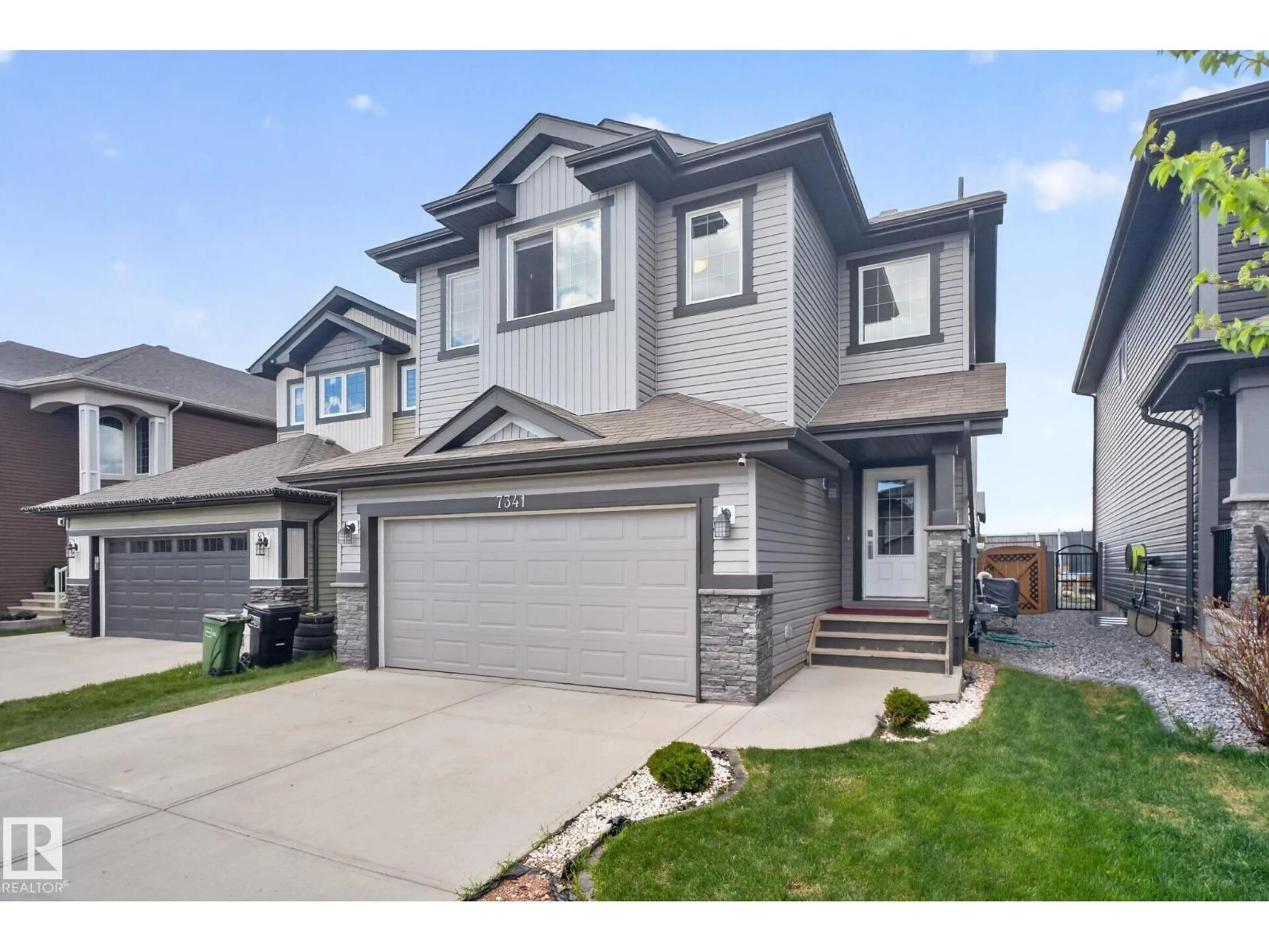 Home with vinyl exterior material, street for SW - 7341 ARMOUR CR, Edmonton Alberta T6W2S2