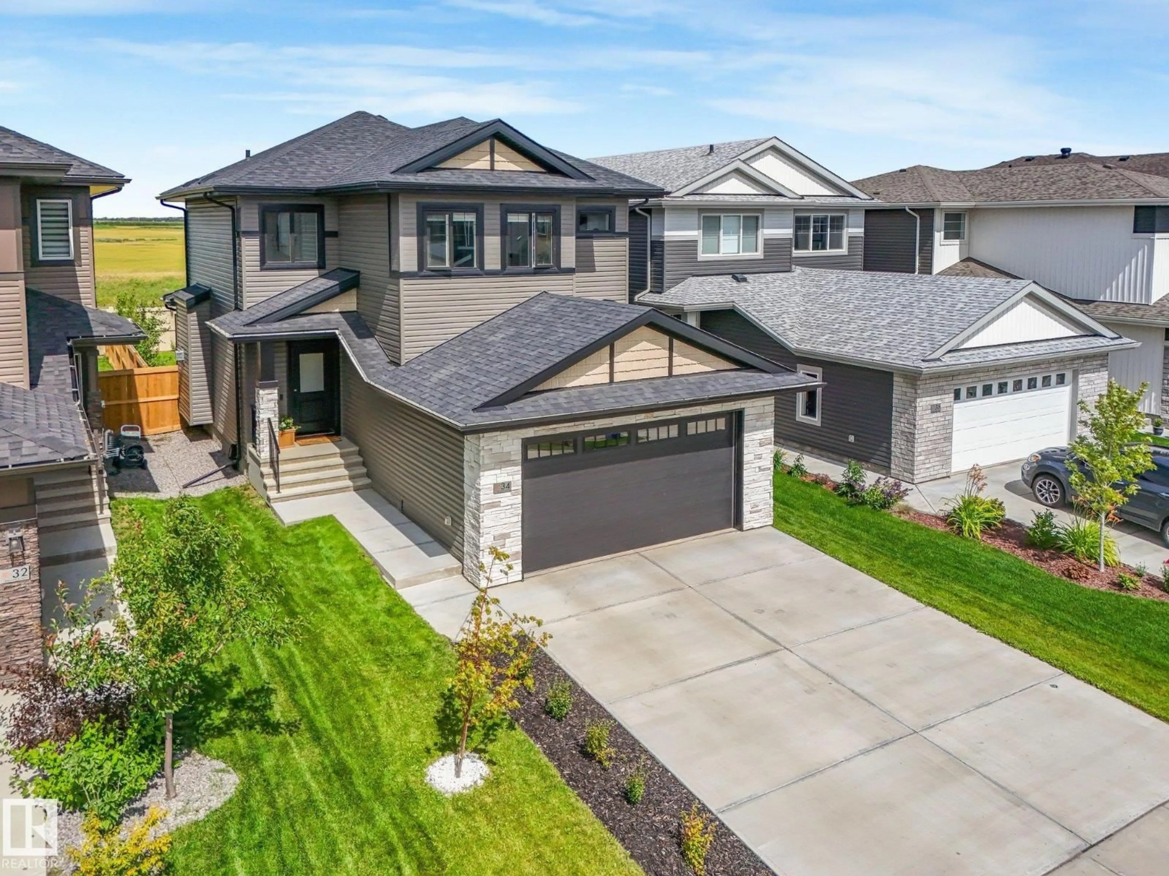 A pic from outside/outdoor area/front of a property/back of a property/a pic from drone, street for 34 EDGEFIELD WY, St. Albert Alberta T8N8A1