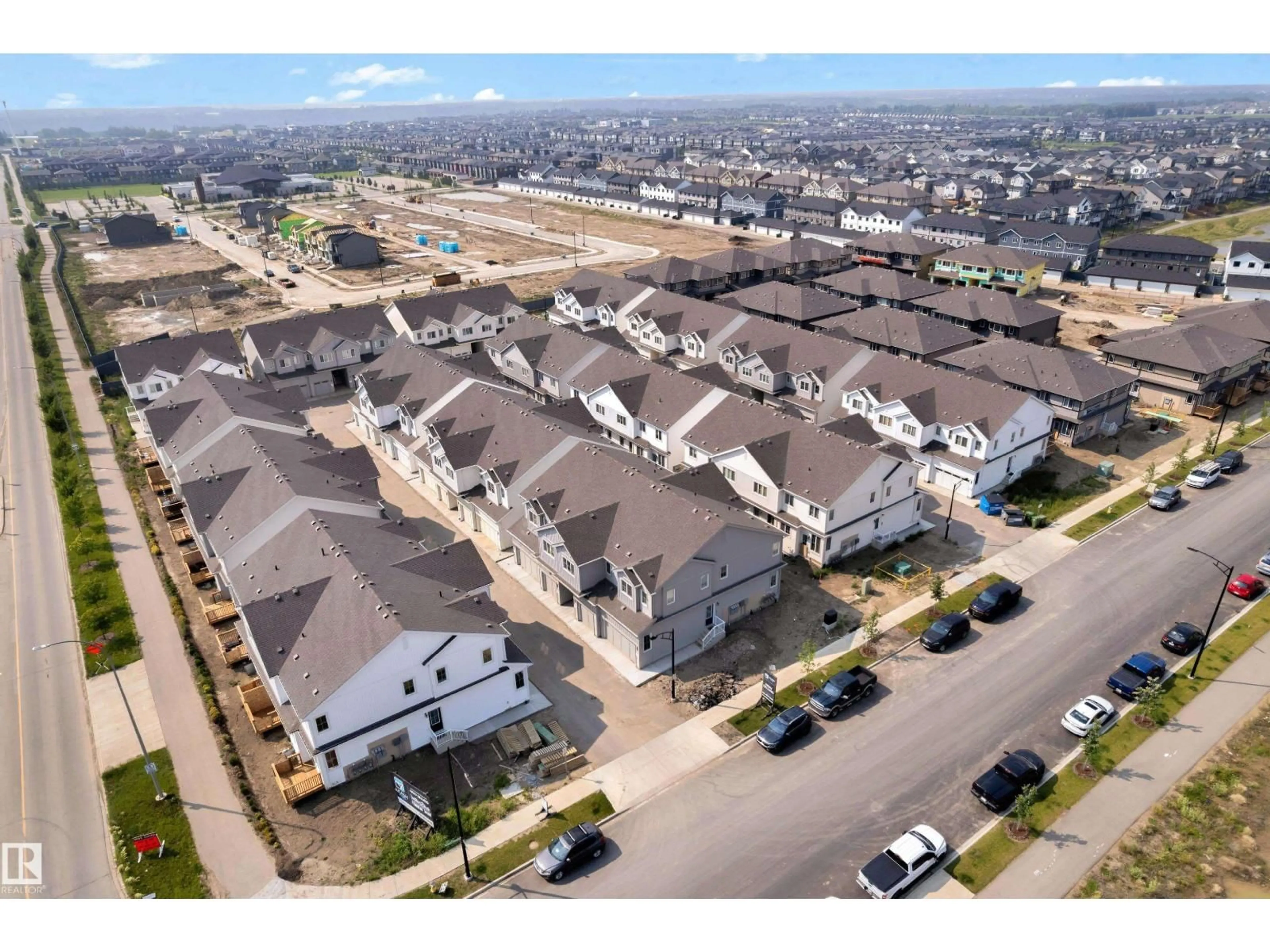 A pic from outside/outdoor area/front of a property/back of a property/a pic from drone, street for #40 - 7110 KESWICK CM, Edmonton Alberta T6W5P7