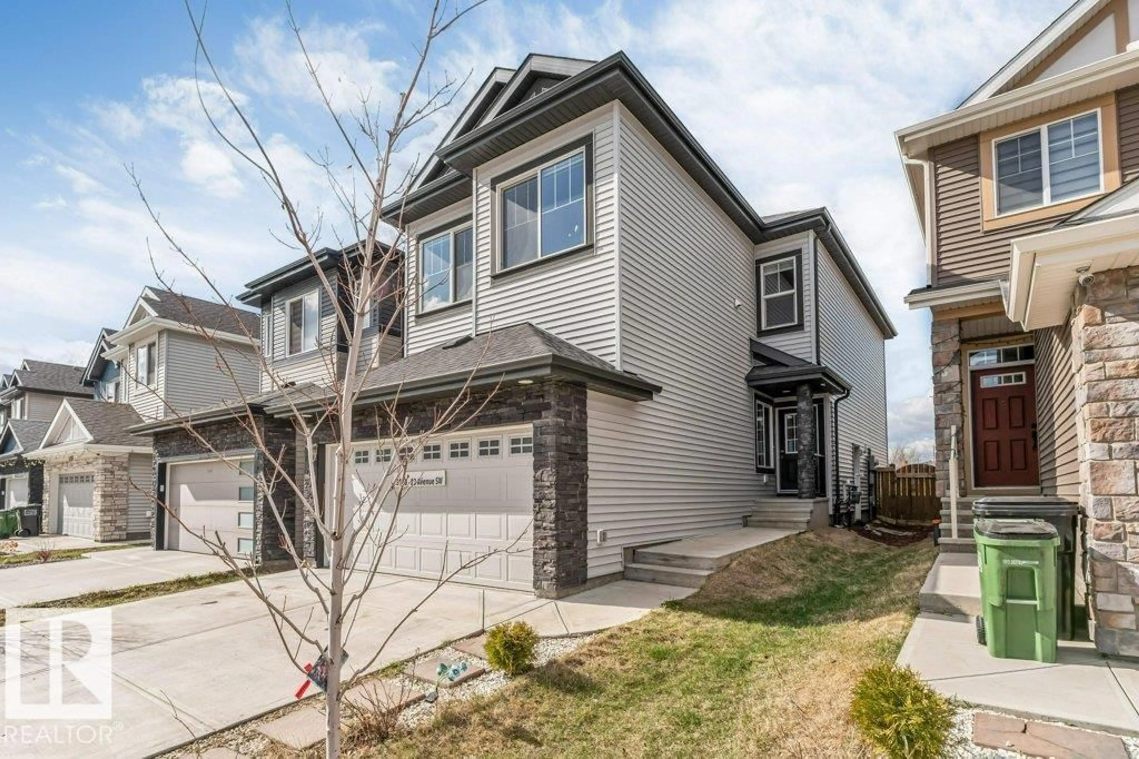 Home with vinyl exterior material, street for 5140 23 AV, Edmonton Alberta T6X2X4