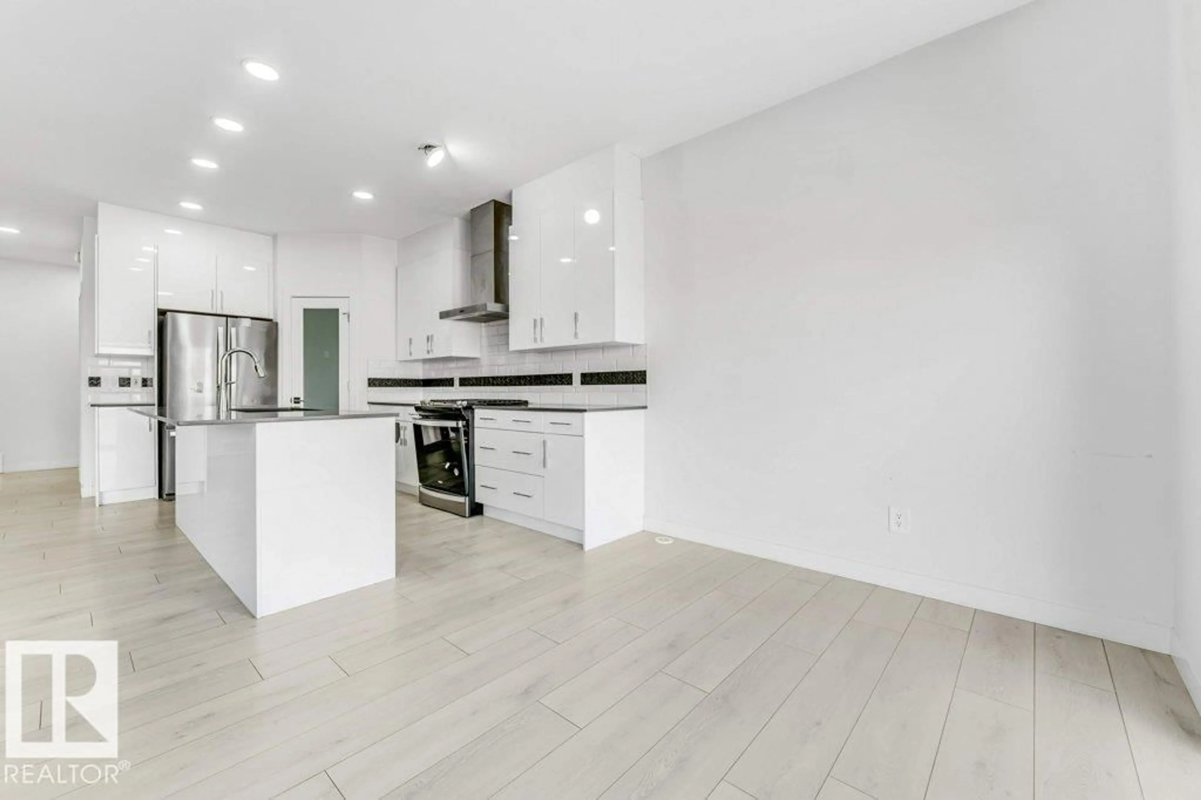 Open concept kitchen, unknown for 5140 23 AV, Edmonton Alberta T6X2X4