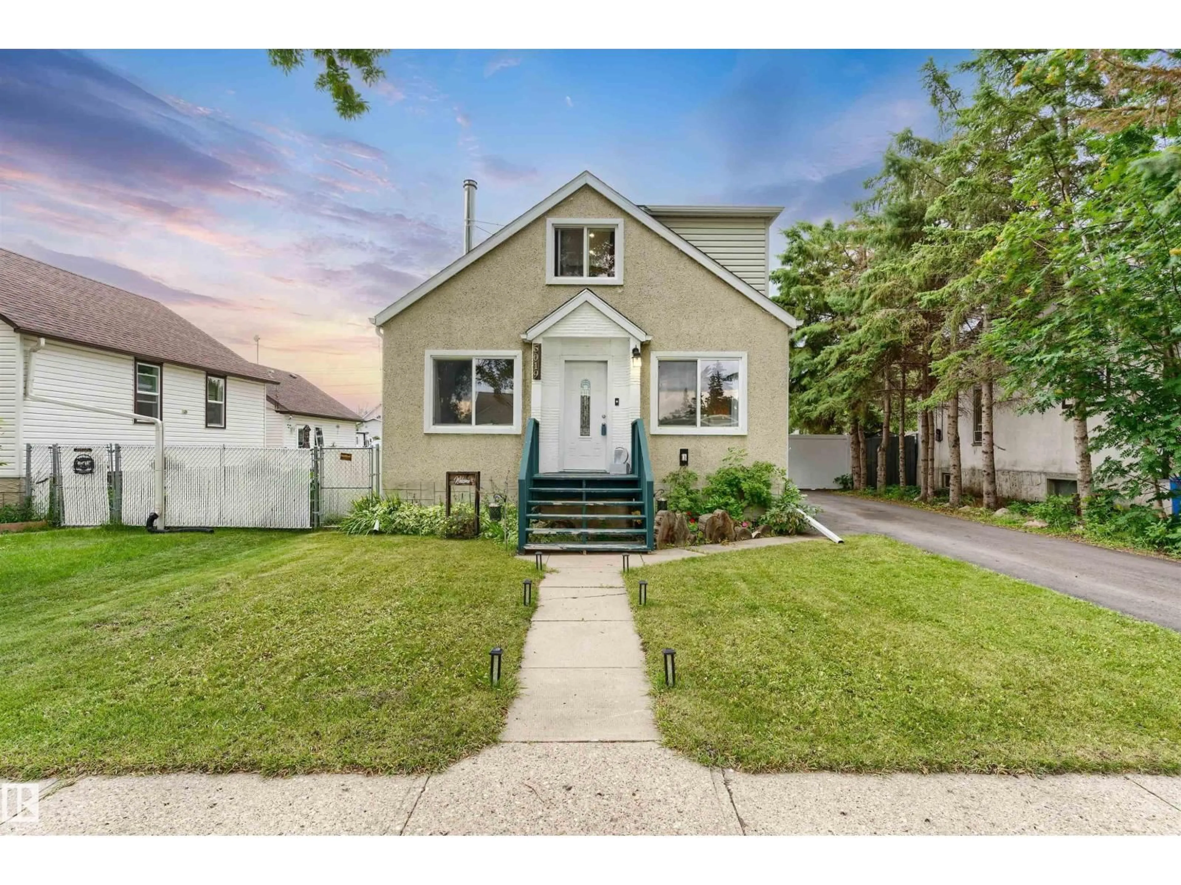 Home with vinyl exterior material, street for 5019 49 ST, Calmar Alberta T0C0V0