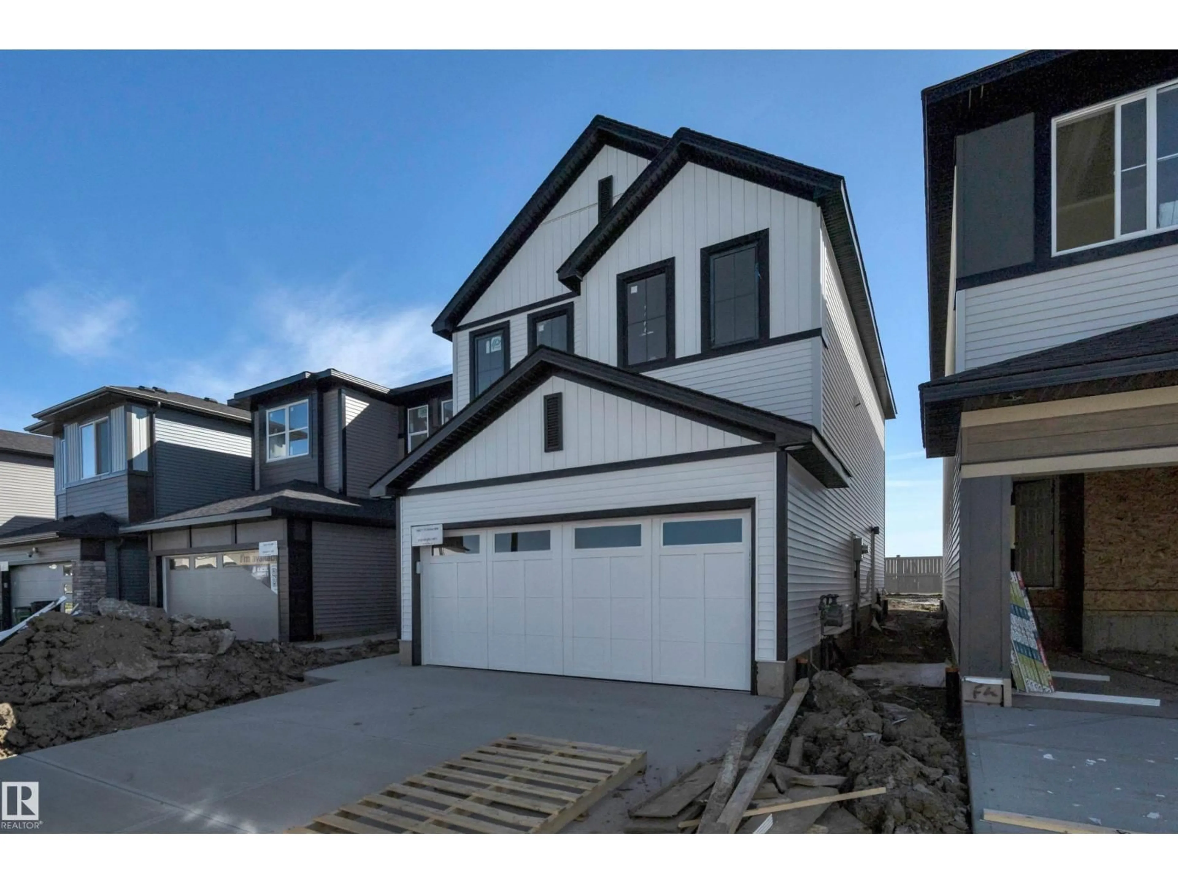 Home with vinyl exterior material, street for 18011 73 ST, Edmonton Alberta T5Z0W7