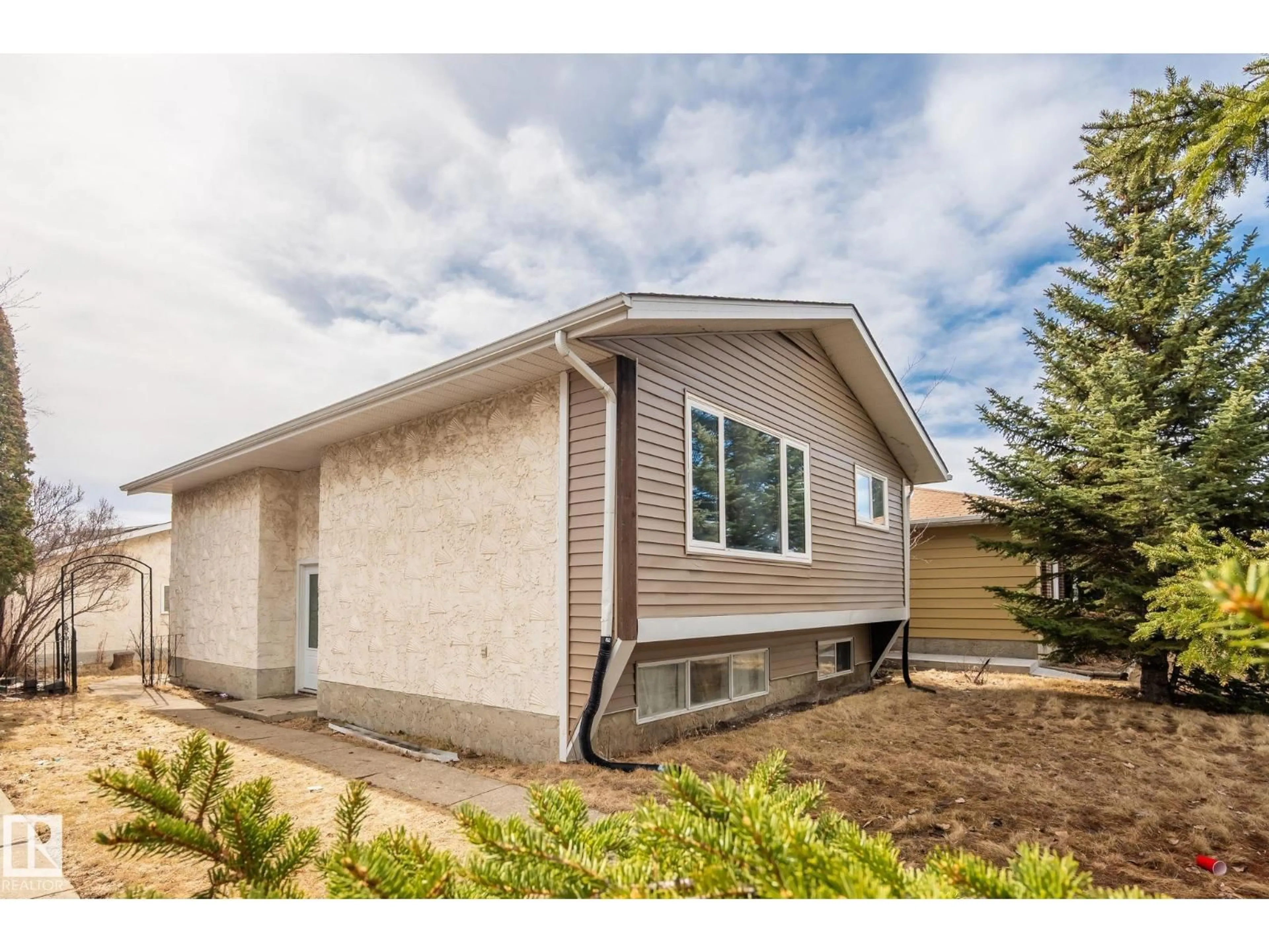 Home with vinyl exterior material, street for 1566 LAKEWOOD ROAD, Edmonton Alberta T6K2V9