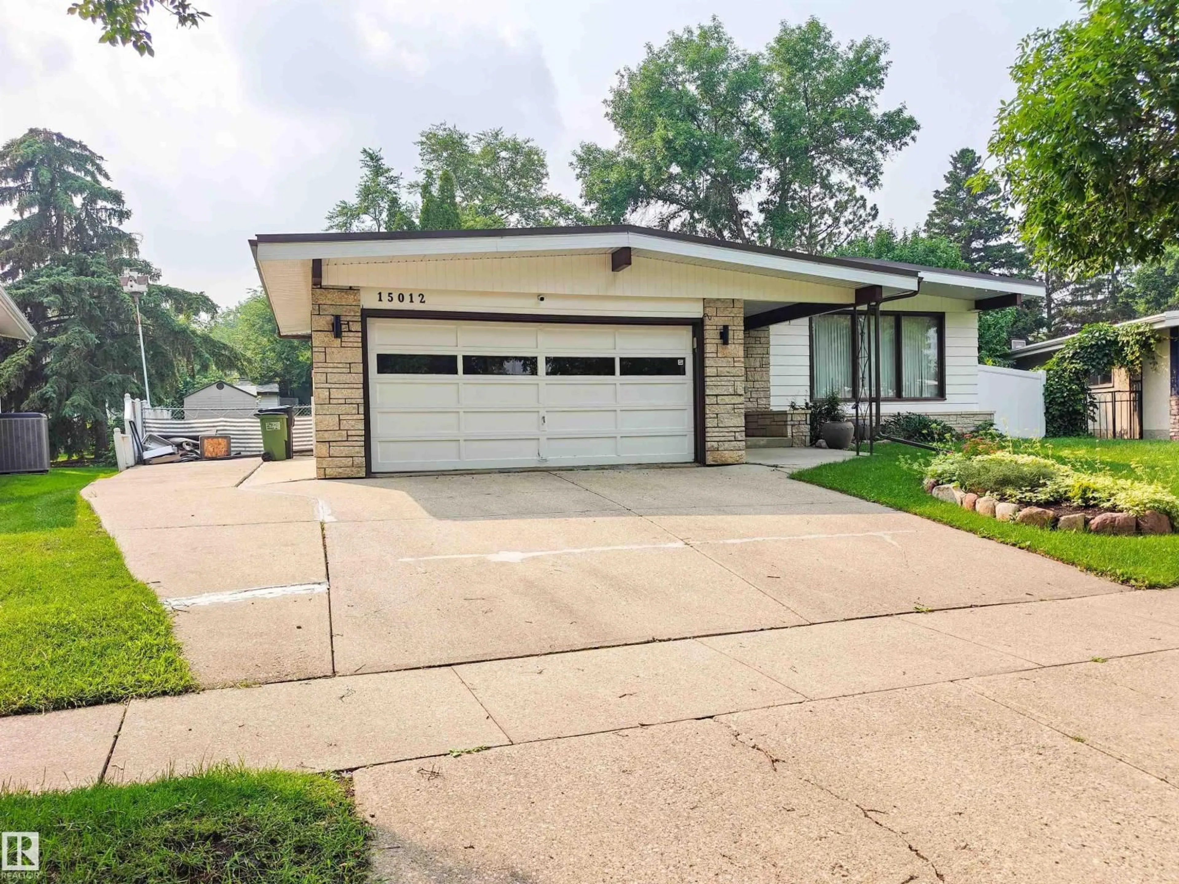 Home with brick exterior material, street for 15012 63 ST, Edmonton Alberta T5A2B8
