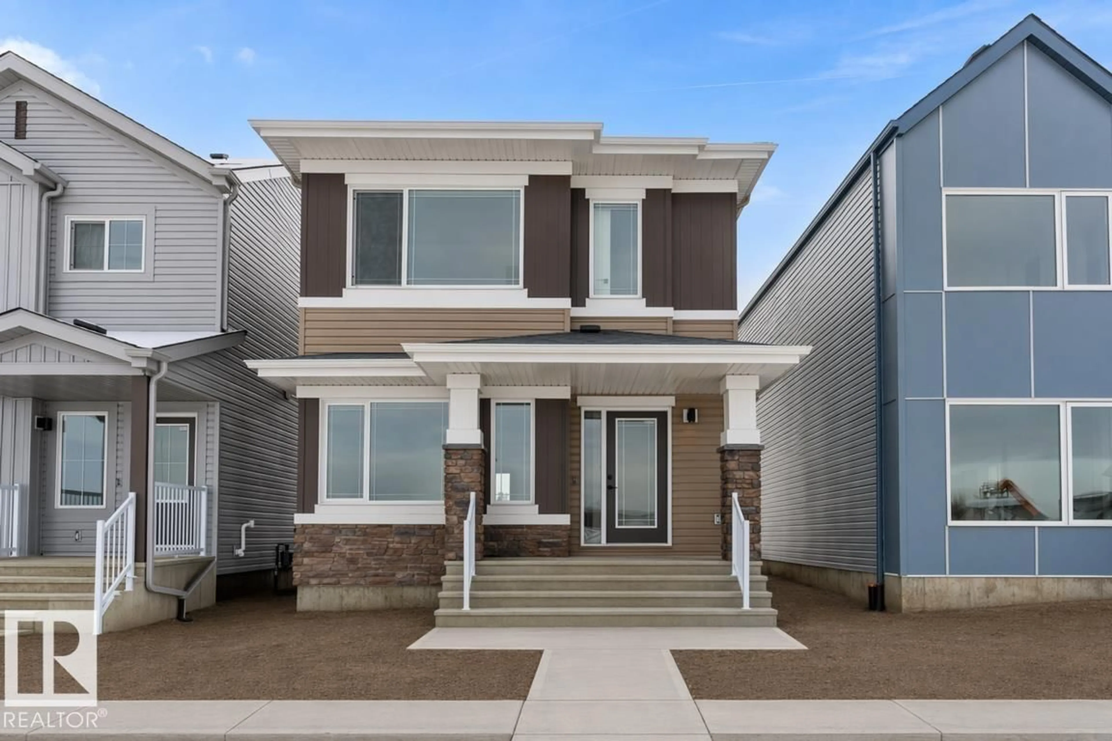 Home with vinyl exterior material, street for 1068 MCLEOD AV, Spruce Grove Alberta T7X4G9