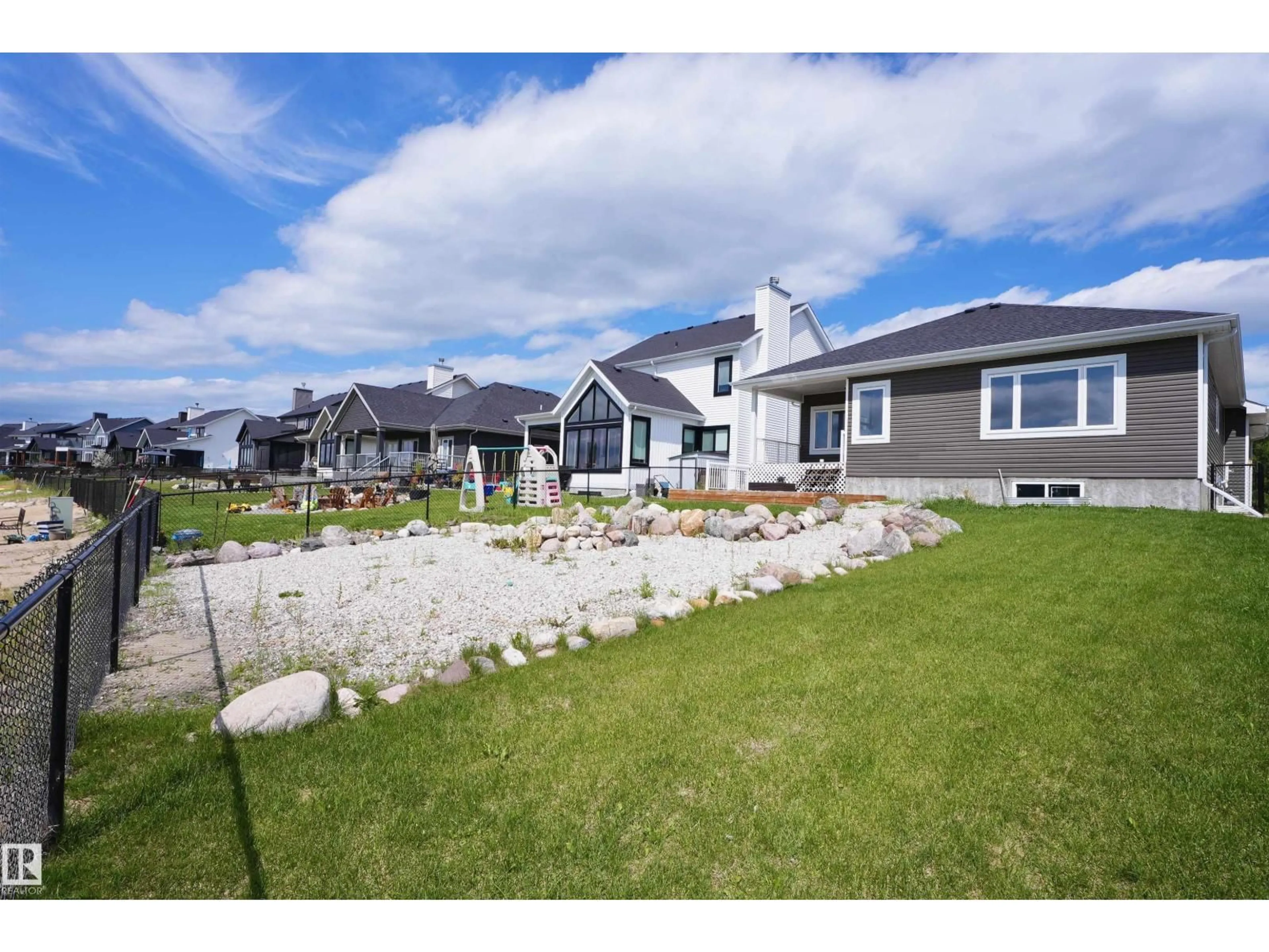 A pic from outside/outdoor area/front of a property/back of a property/a pic from drone, unknown for #20 - 3410 STE. ANNE TR, Rural Lac Ste. Anne County Alberta T0E0A1