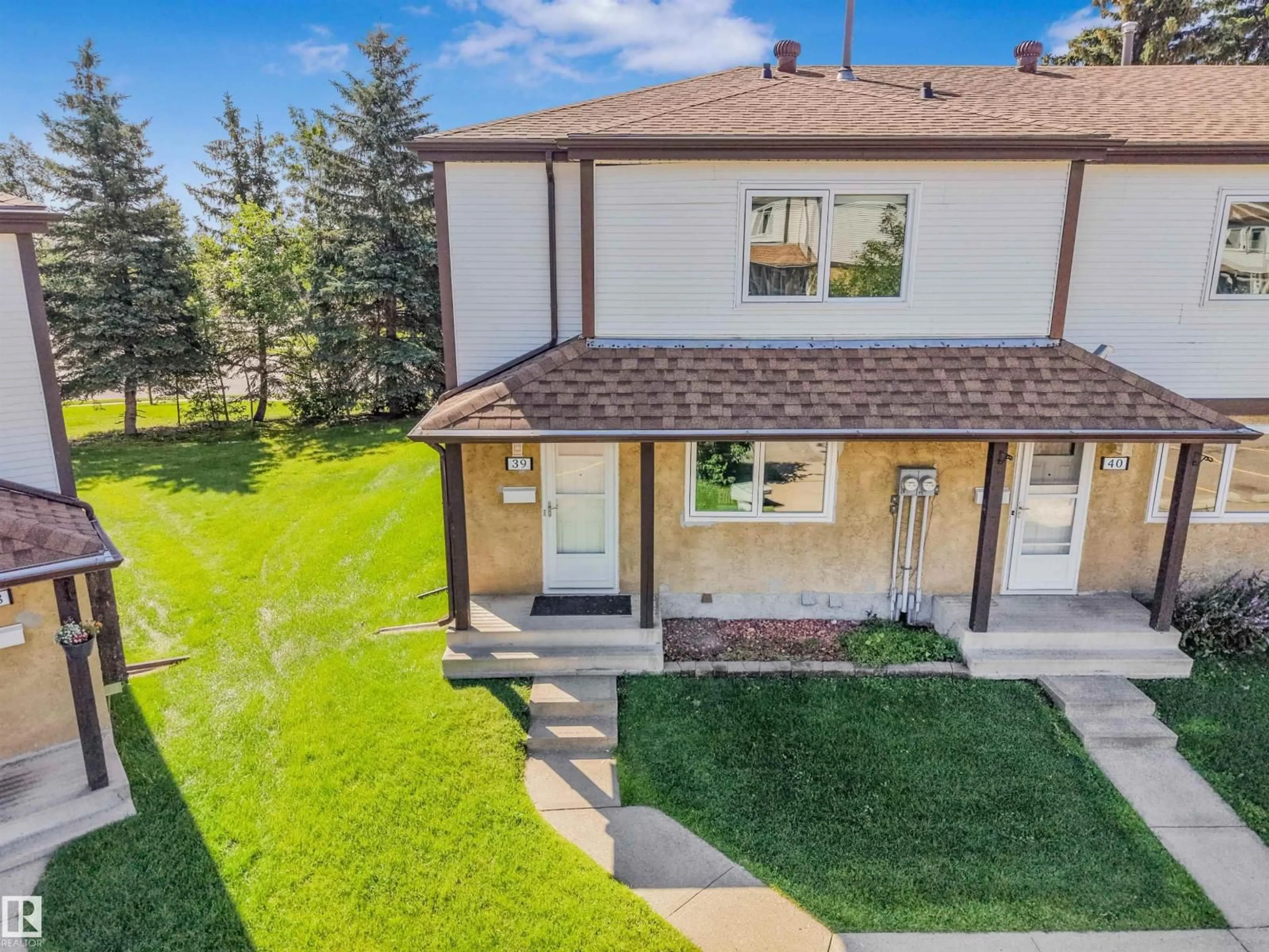 A pic from outside/outdoor area/front of a property/back of a property/a pic from drone, mountain view for #39 - 14511 52 ST, Edmonton Alberta T5A4M6