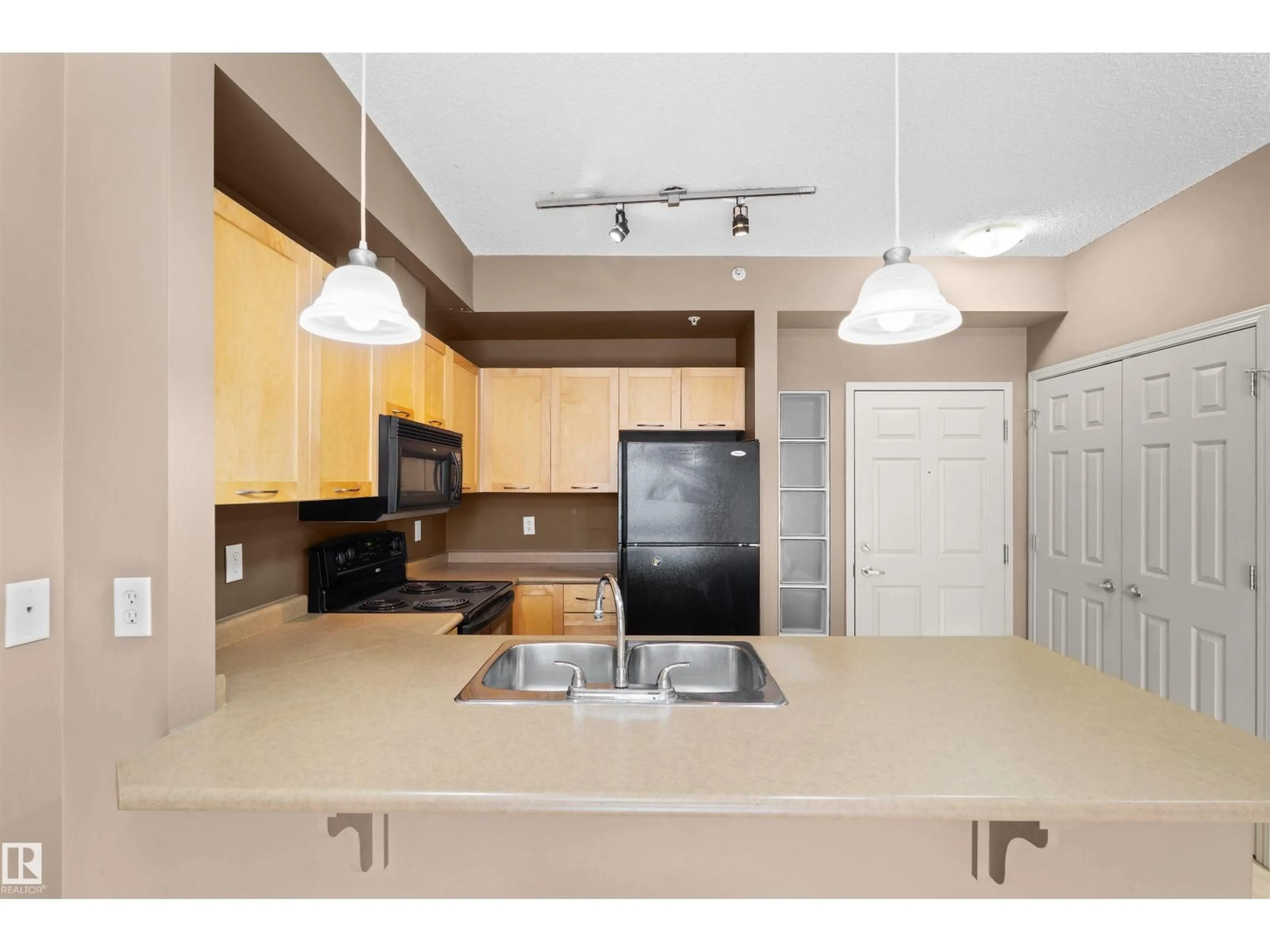 Standard kitchen, unknown for #1-516 - 4245 139 AV, Edmonton Alberta T5Y3E8