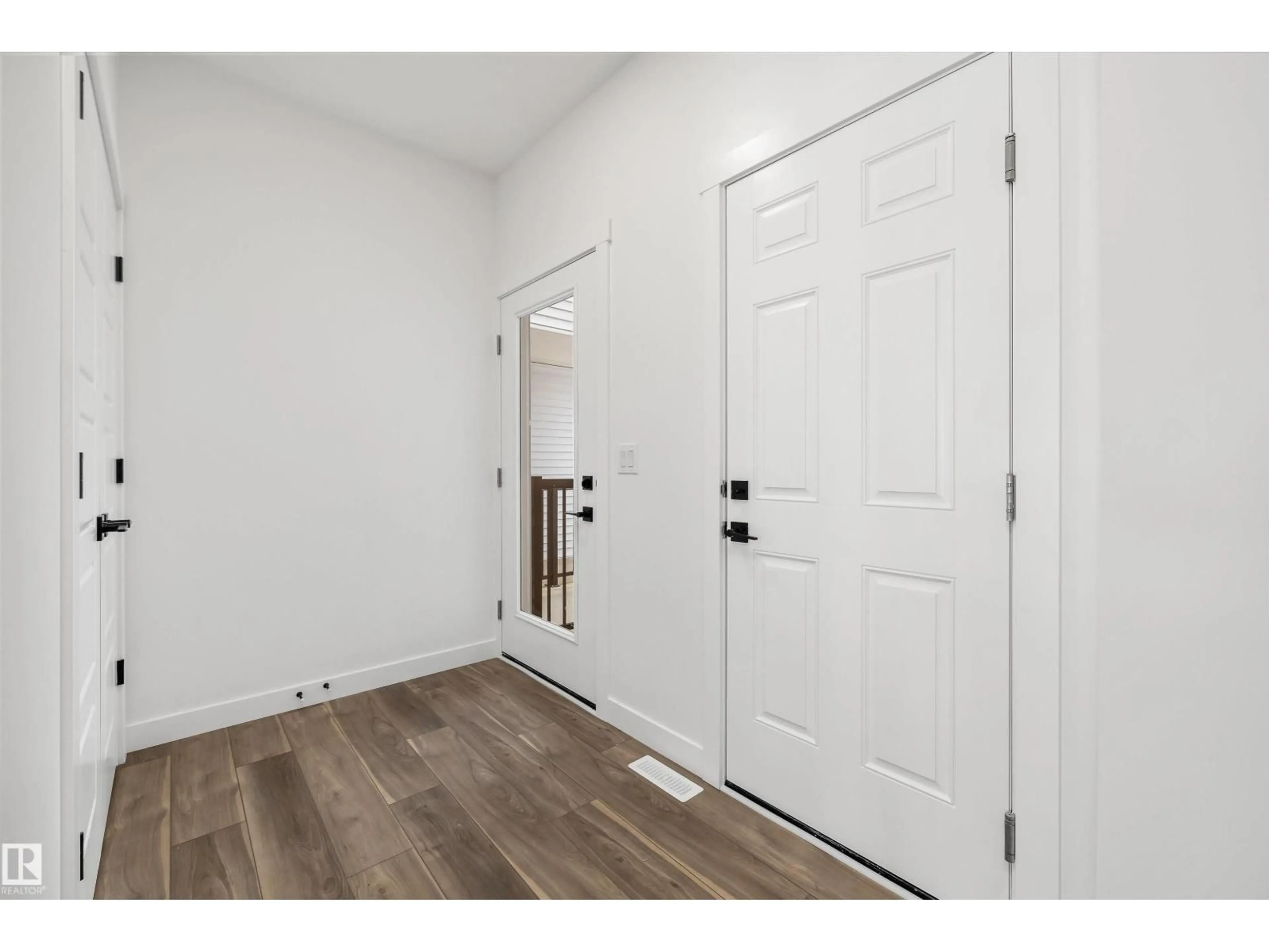 Indoor entryway for 18931 28 AV NW, Edmonton Alberta T6M3H9