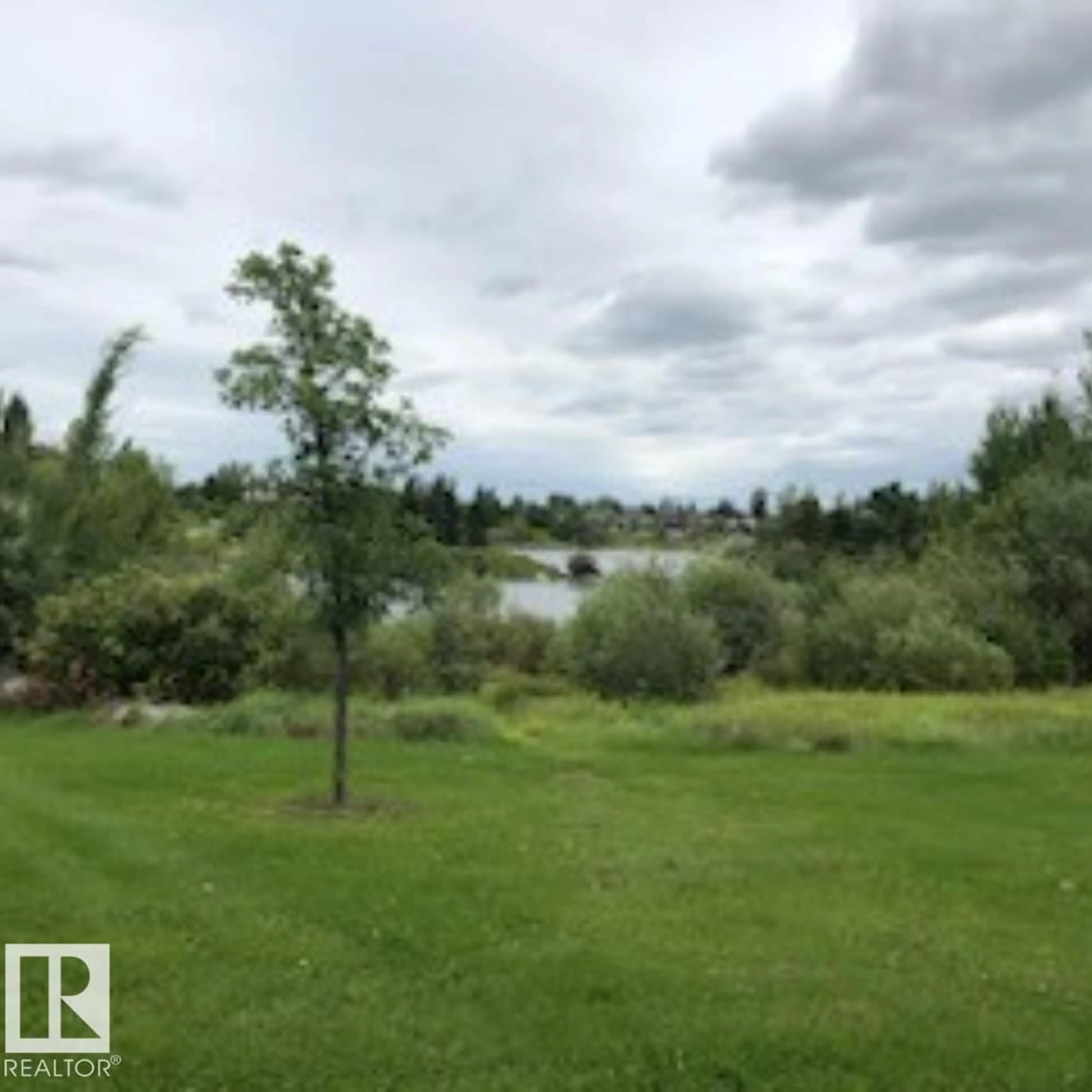 A pic from outside/outdoor area/front of a property/back of a property/a pic from drone, water/lake/river/ocean view for 85 - 13 NORTHRIDGE DR, St. Albert Alberta T8N3N3