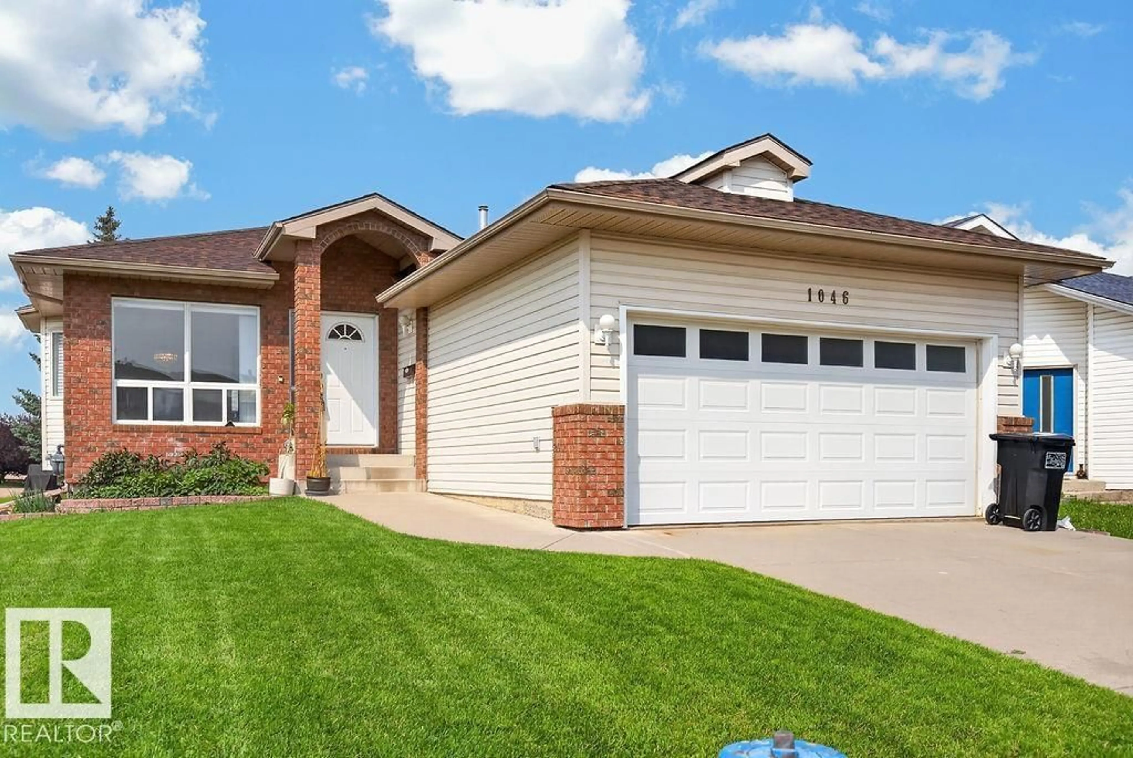 Home with vinyl exterior material, street for 1046 JONES CR, Edmonton Alberta T6L6Y2