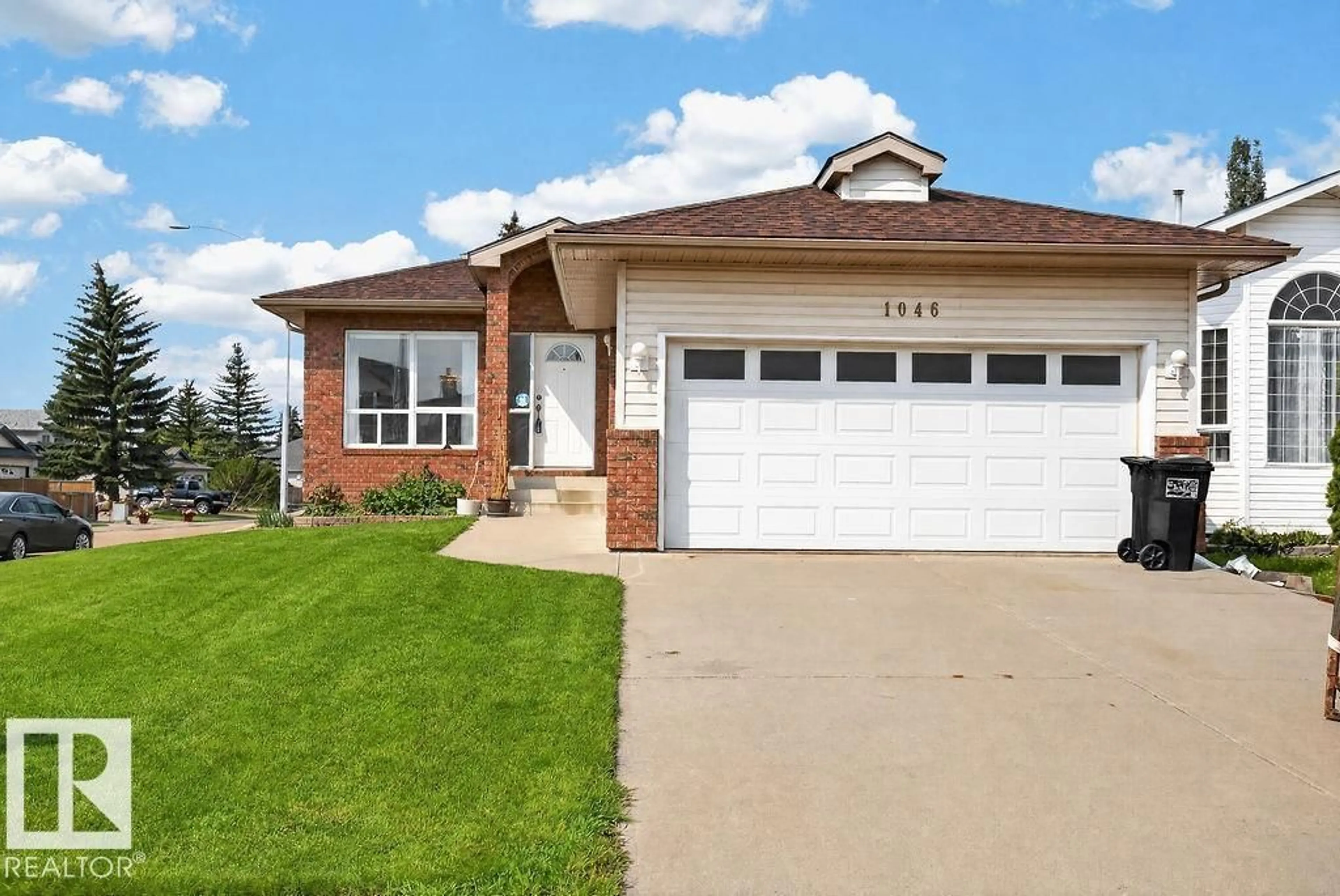 Home with vinyl exterior material, street for 1046 JONES CR, Edmonton Alberta T6L6Y2