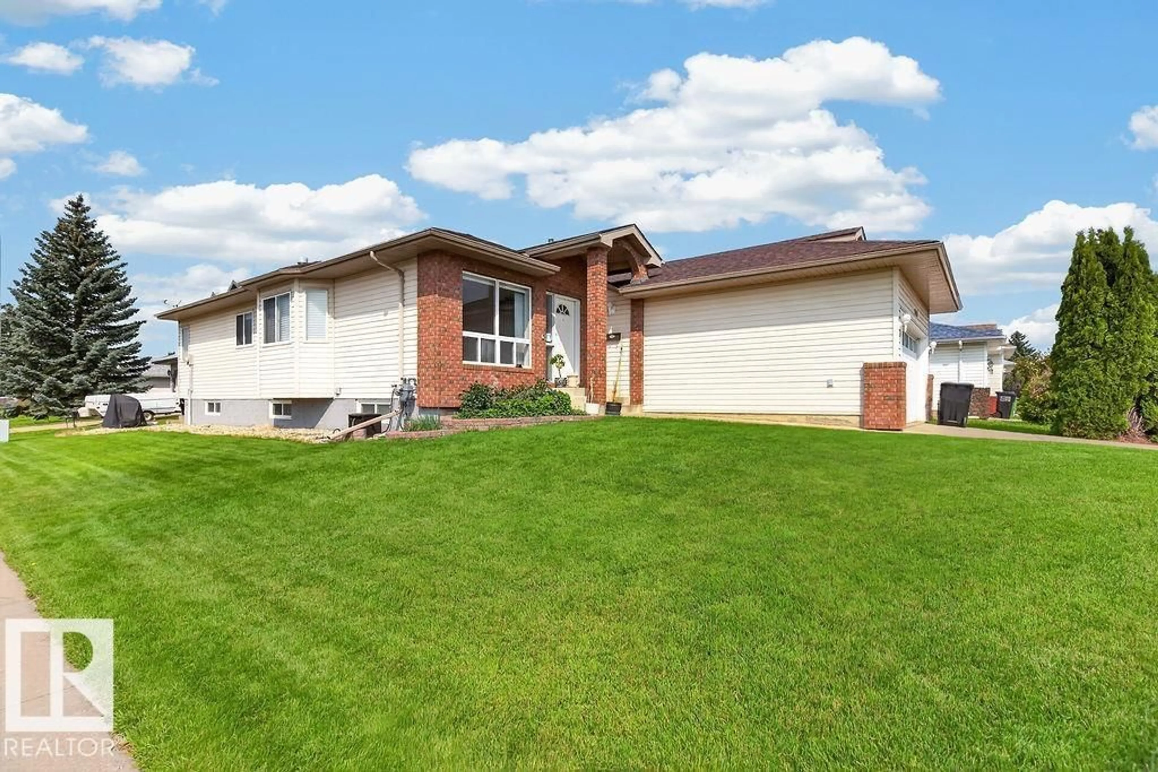 Home with vinyl exterior material, street for 1046 JONES CR, Edmonton Alberta T6L6Y2