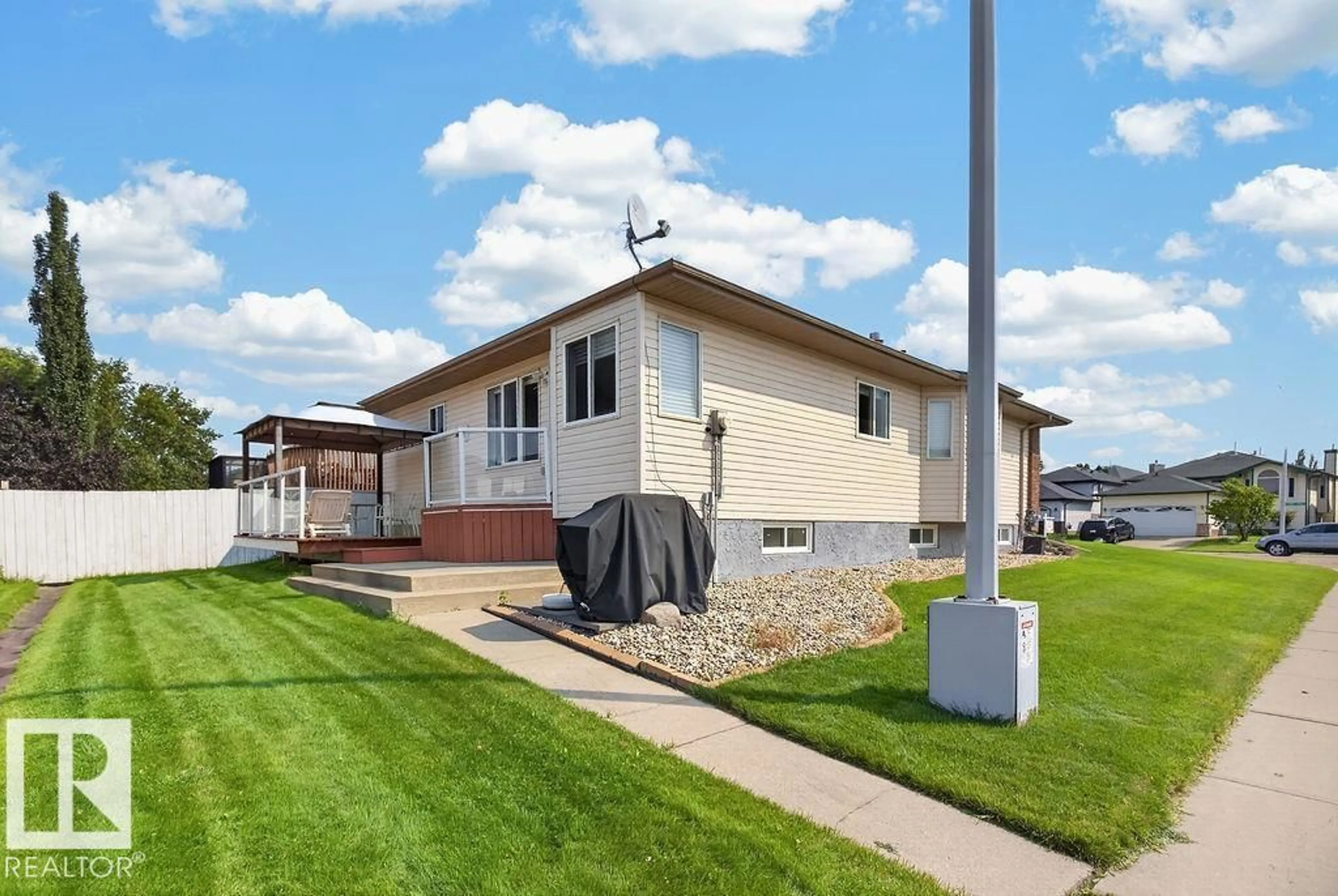 Home with vinyl exterior material, street for 1046 JONES CR, Edmonton Alberta T6L6Y2