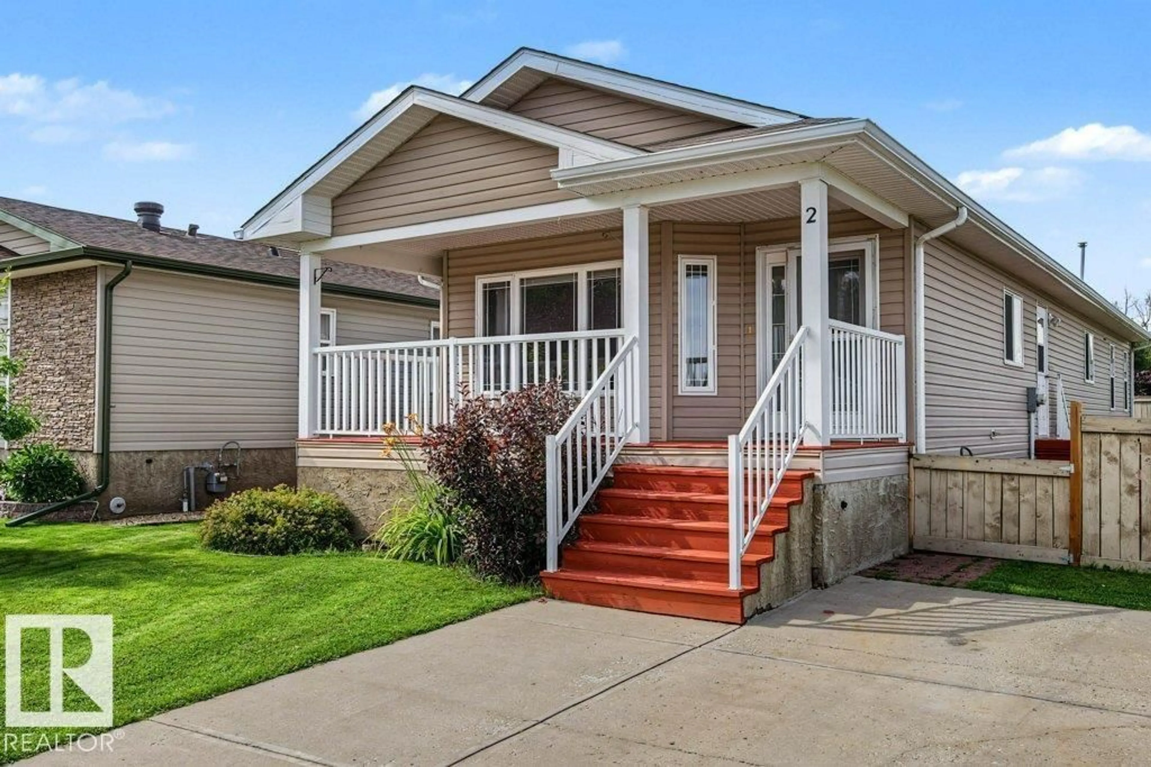 Home with vinyl exterior material, street for 2 JUTLAND CR, Stony Plain Alberta T7Z0A3