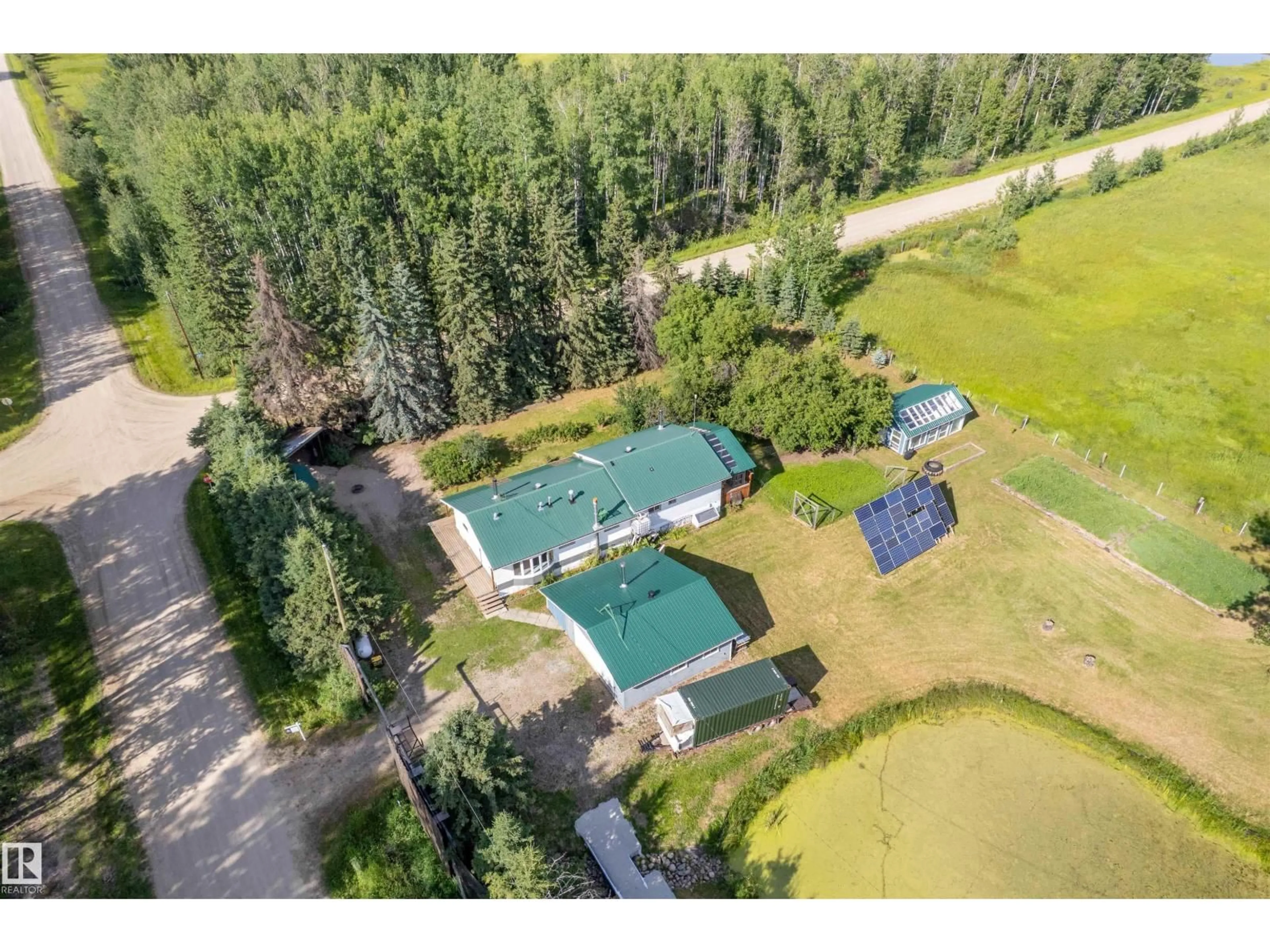 A pic from outside/outdoor area/front of a property/back of a property/a pic from drone, unknown for 453081 RGE ROAD 75, Rural Wetaskiwin County Alberta T4J1L4