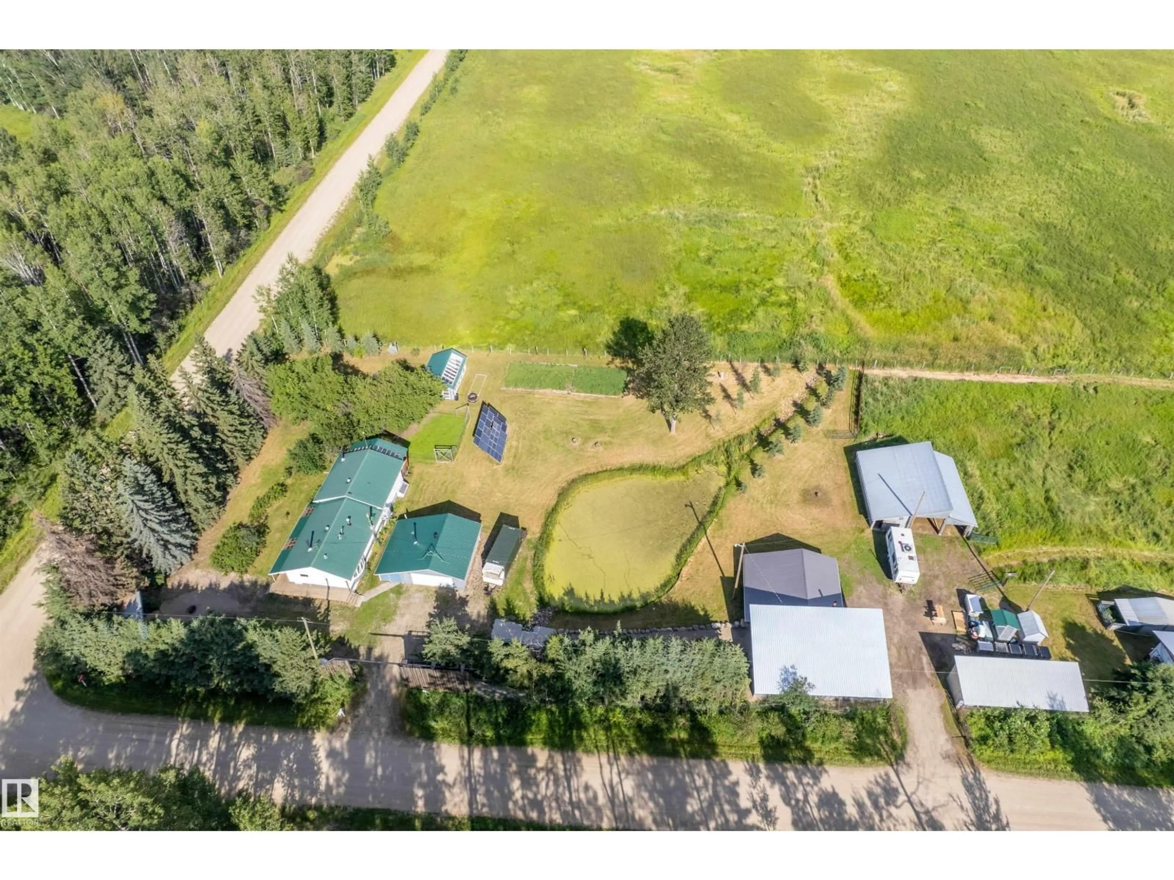 A pic from outside/outdoor area/front of a property/back of a property/a pic from drone, unknown for 453081 RGE ROAD 75, Rural Wetaskiwin County Alberta T4J1L4