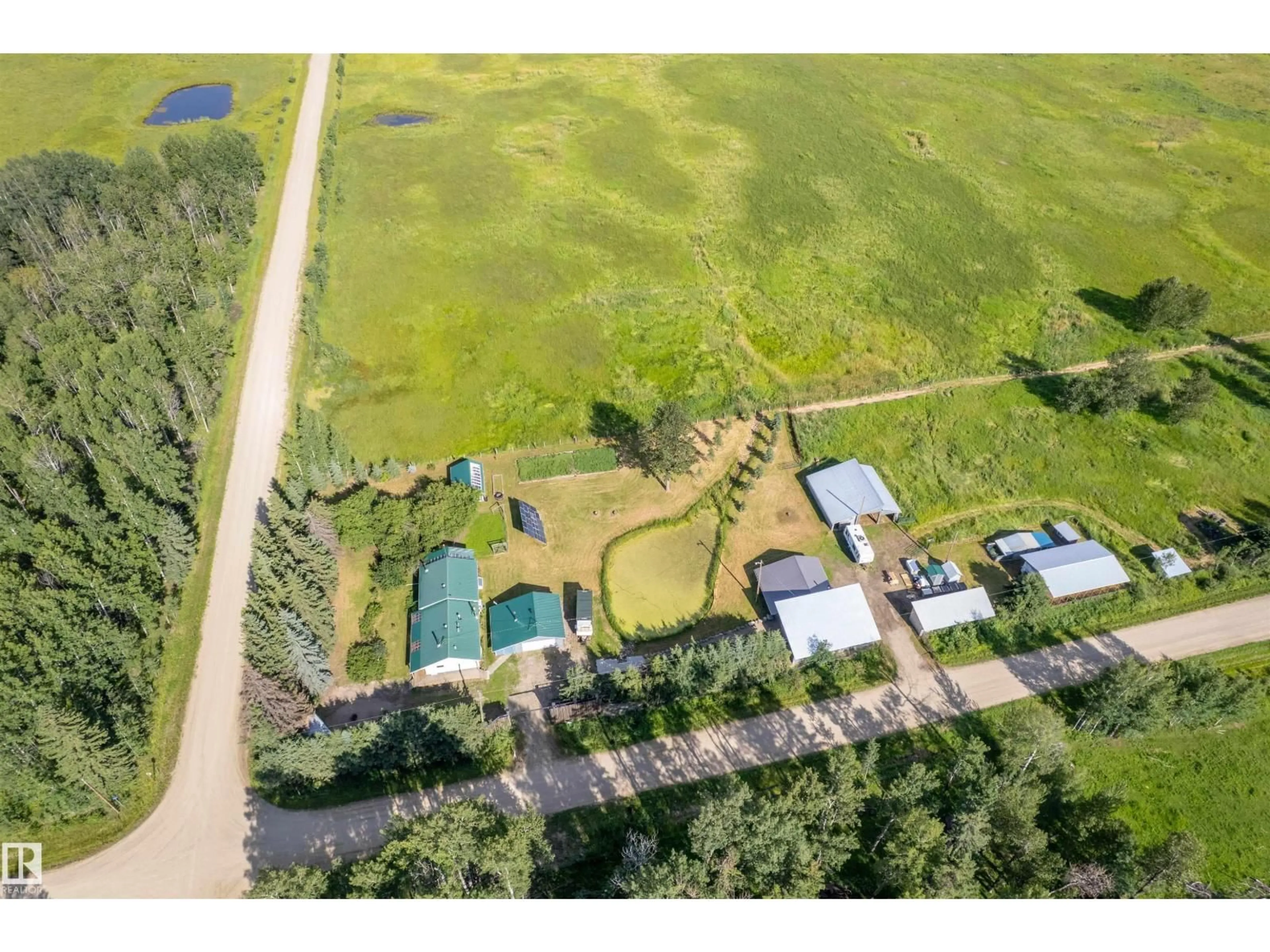 A pic from outside/outdoor area/front of a property/back of a property/a pic from drone, water/lake/river/ocean view for 453081 RGE ROAD 75, Rural Wetaskiwin County Alberta T4J1L4
