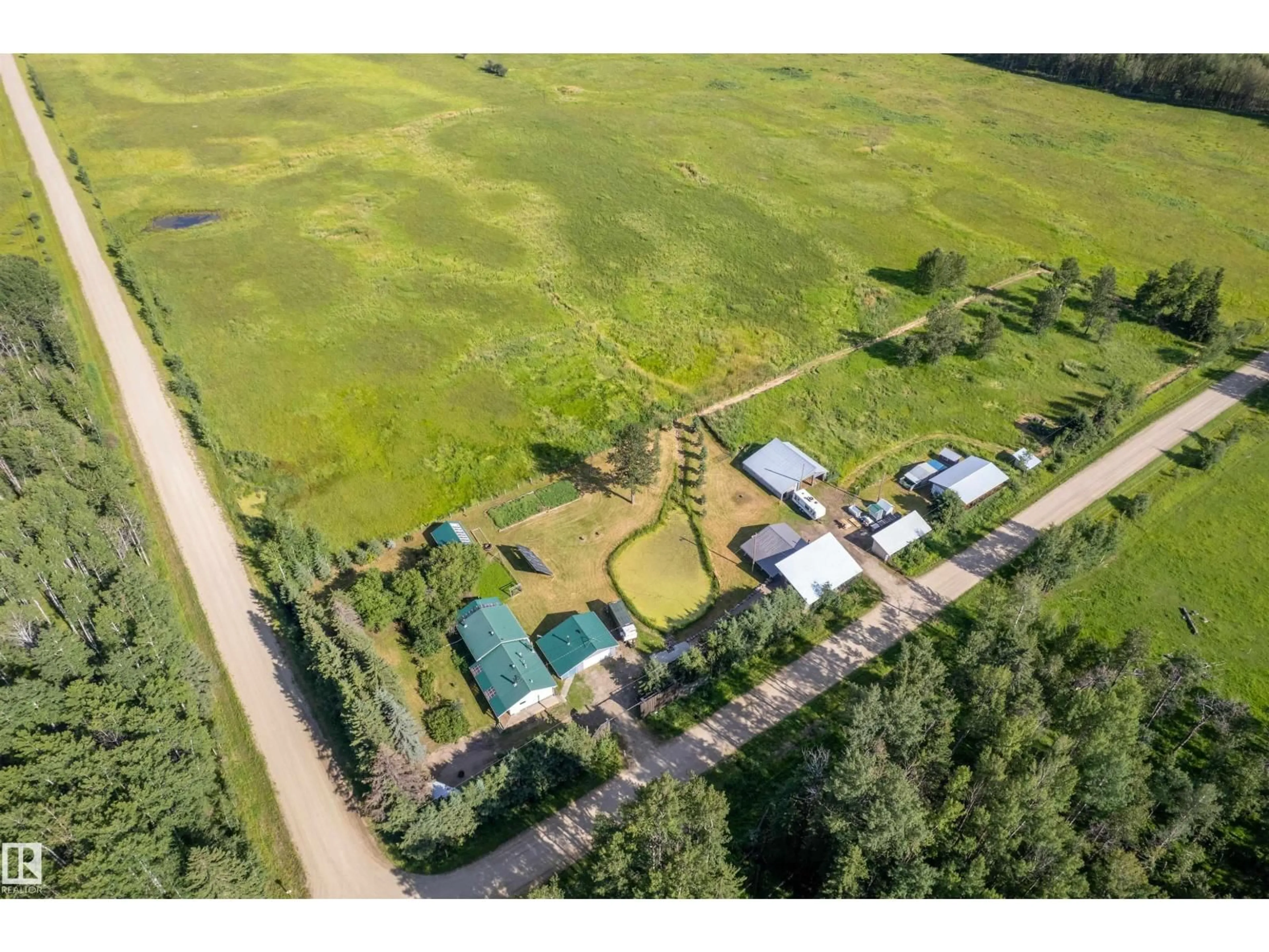 A pic from outside/outdoor area/front of a property/back of a property/a pic from drone, street for 453081 RGE ROAD 75, Rural Wetaskiwin County Alberta T4J1L4