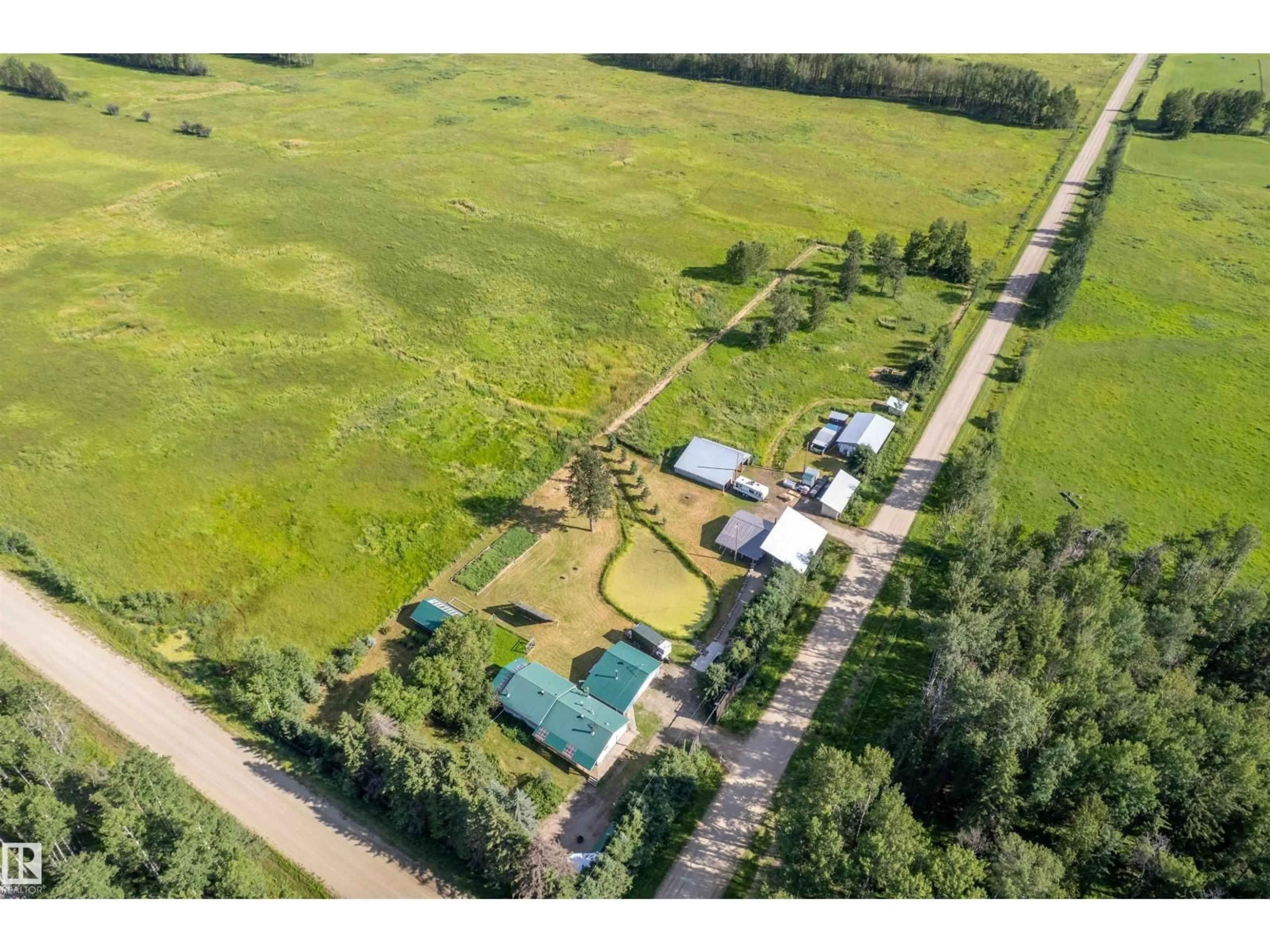 A pic from outside/outdoor area/front of a property/back of a property/a pic from drone, street for 453081 RGE ROAD 75, Rural Wetaskiwin County Alberta T4J1L4