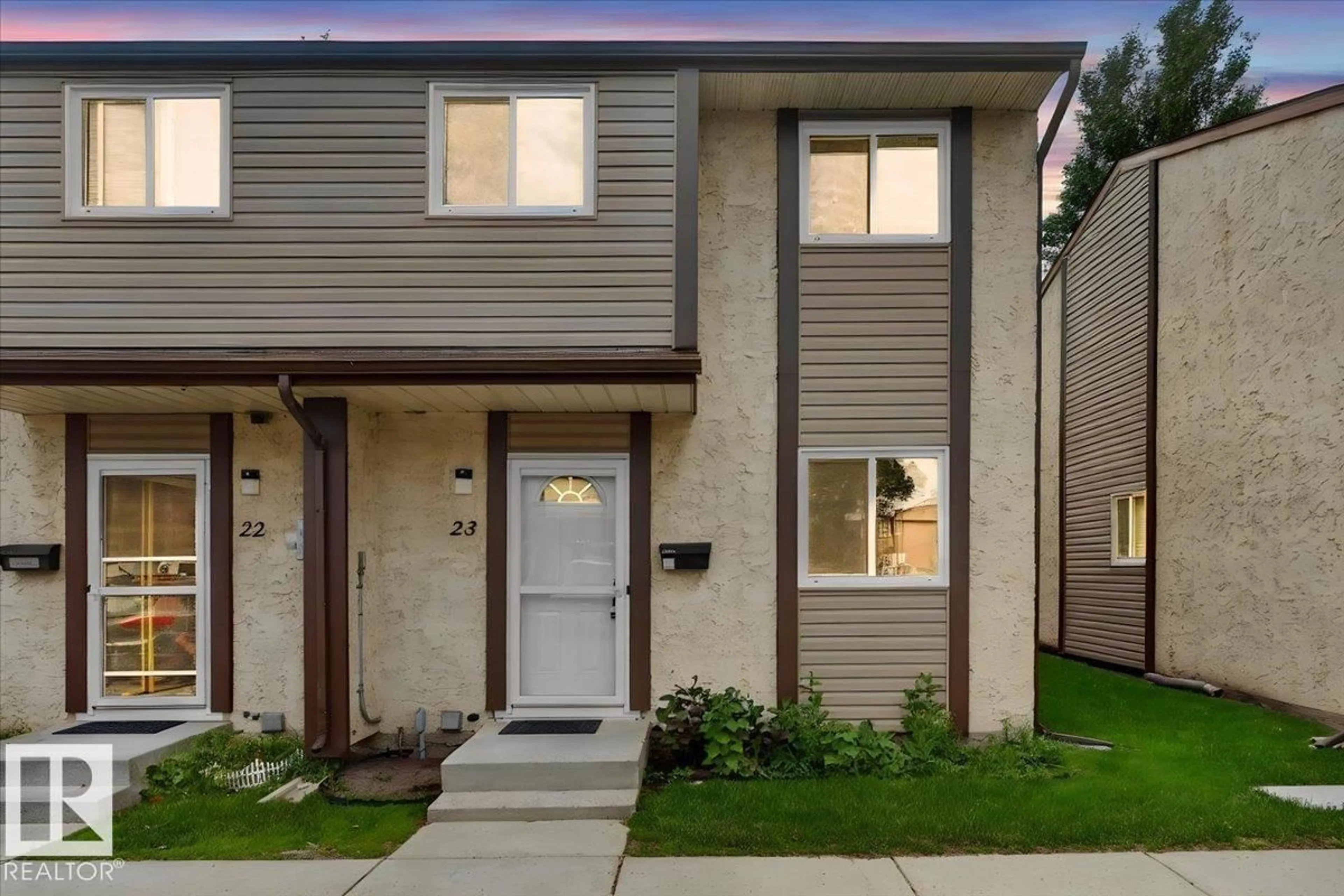 Home with vinyl exterior material, street for #23 - 10453 20 AV, Edmonton Alberta T6J5H1