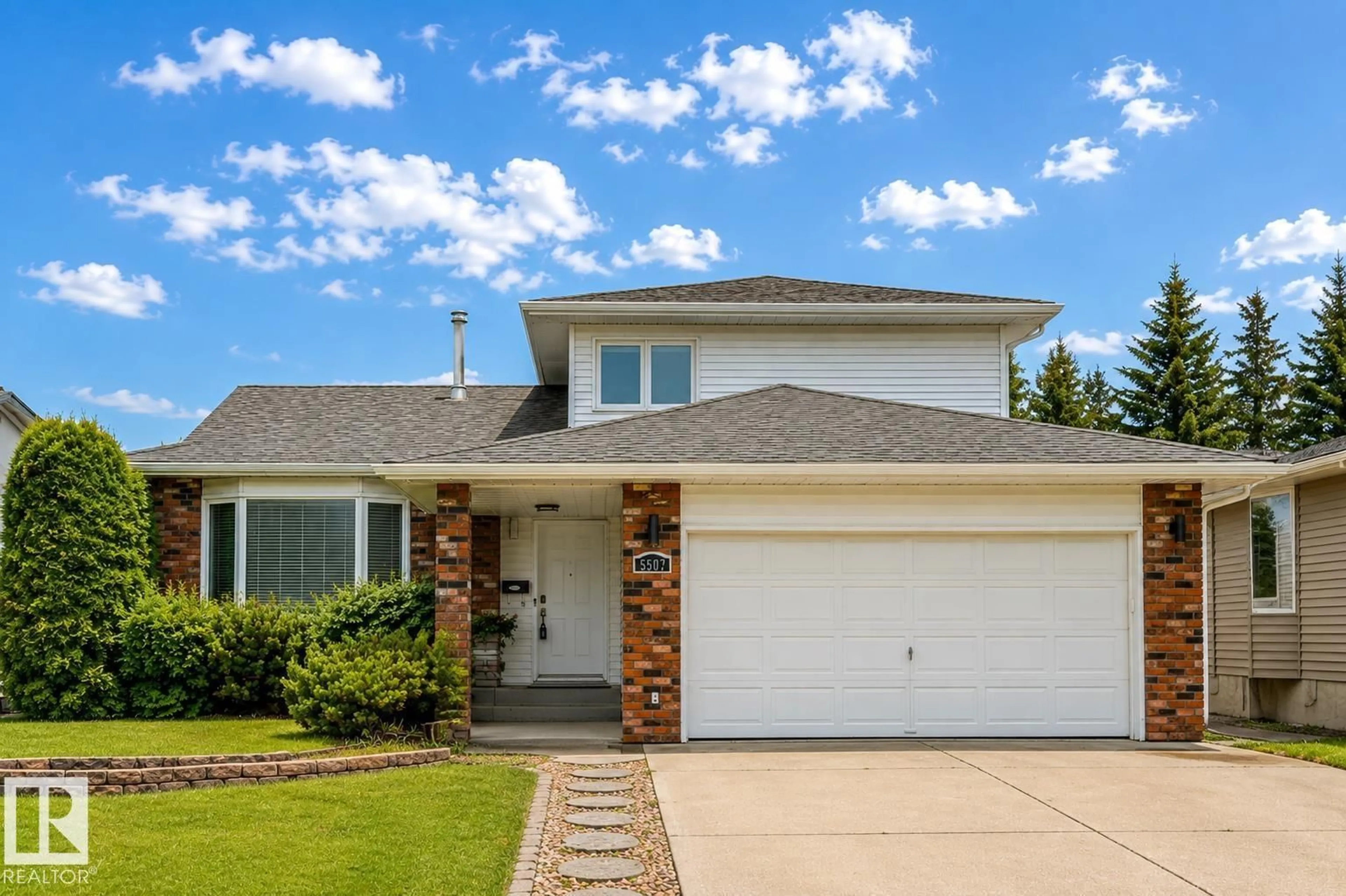 Home with vinyl exterior material, street for 5507 179 ST, Edmonton Alberta T6M1X1
