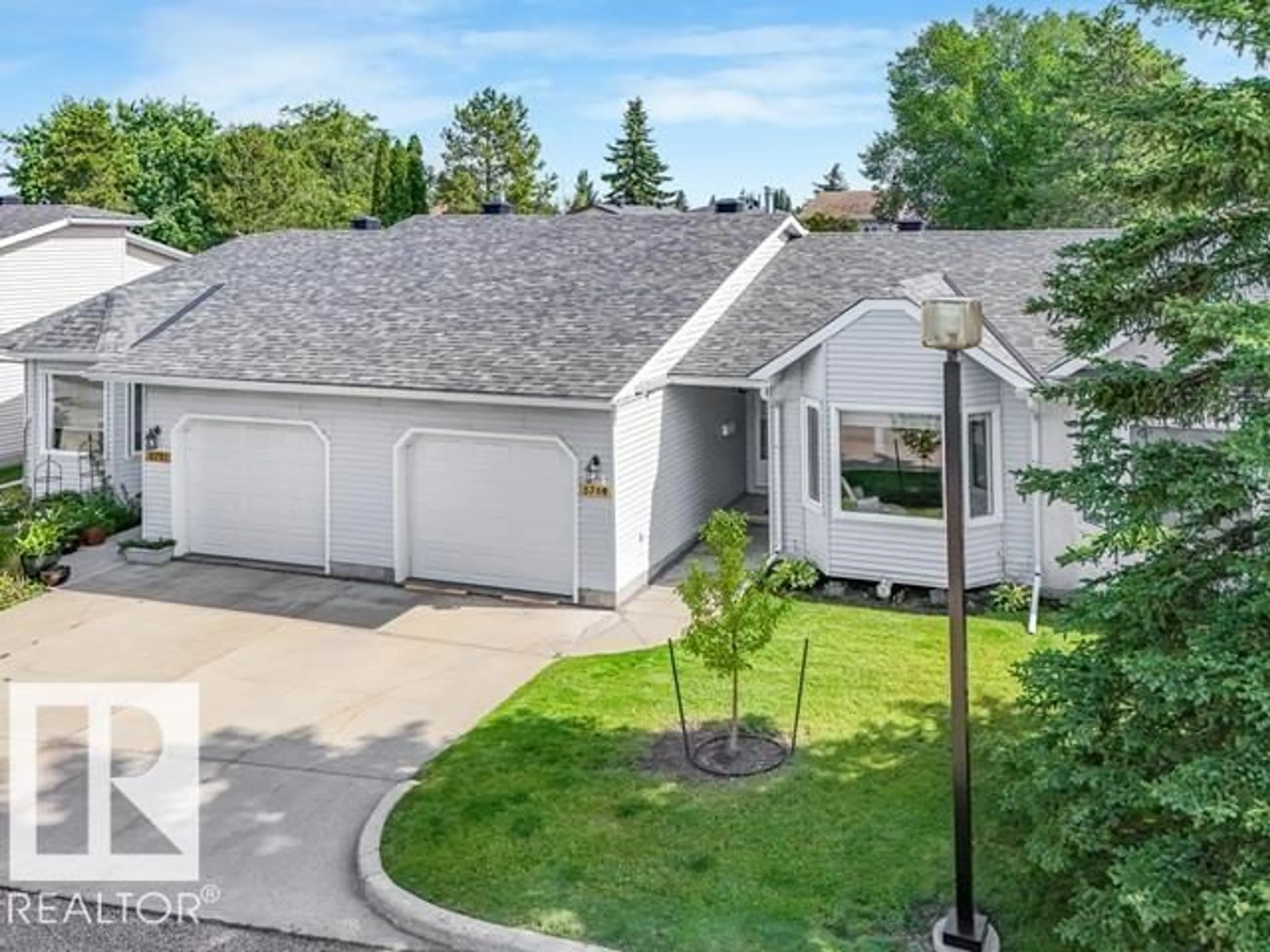 A pic from outside/outdoor area/front of a property/back of a property/a pic from drone, street for 5749 189 ST, Edmonton Alberta T6M2G8