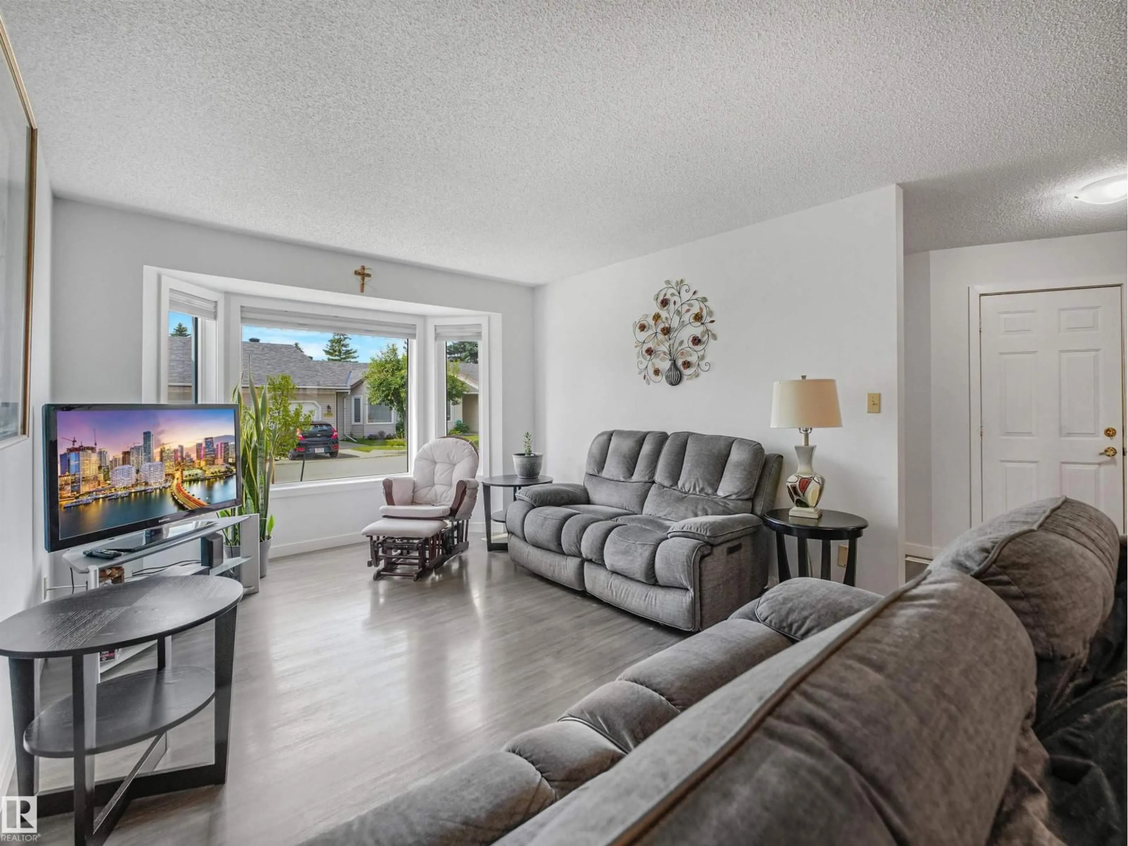Living room with furniture, unknown for 5749 189 ST, Edmonton Alberta T6M2G8