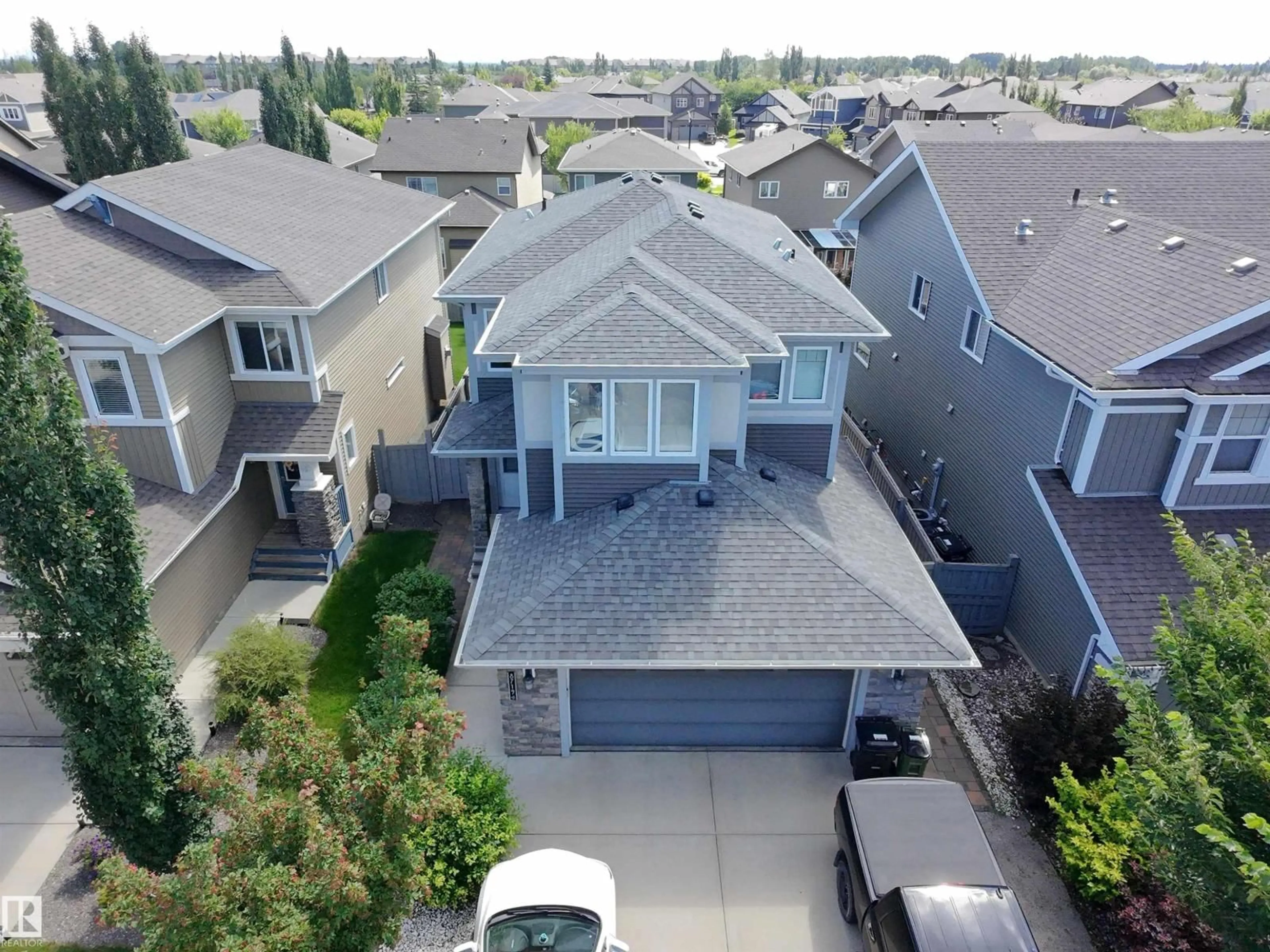 A pic from outside/outdoor area/front of a property/back of a property/a pic from drone, street for NW - 8719 218 ST, Edmonton Alberta T5T4R7