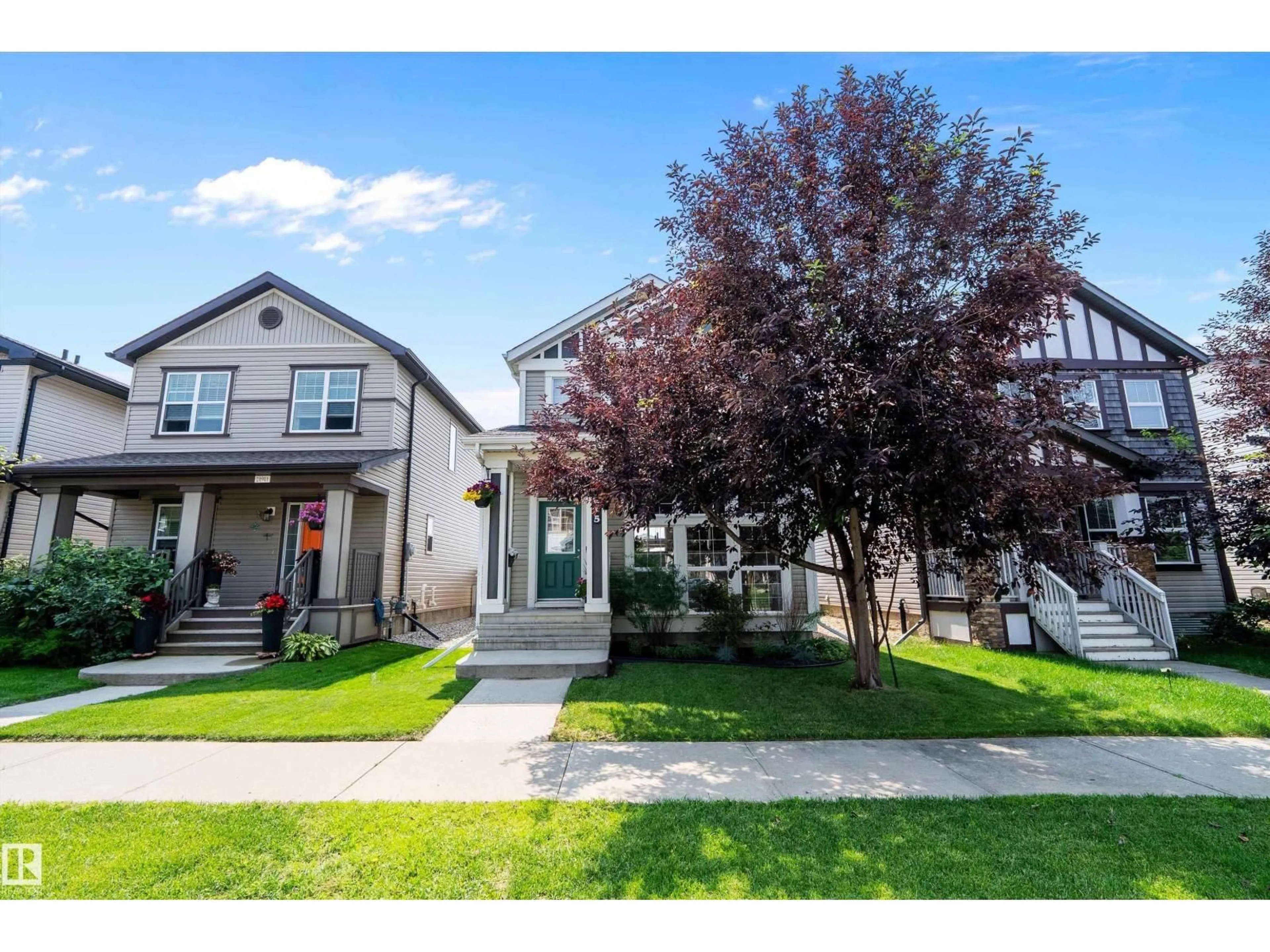 Home with vinyl exterior material, street for 21915 99 AV, Edmonton Alberta T5T4M5