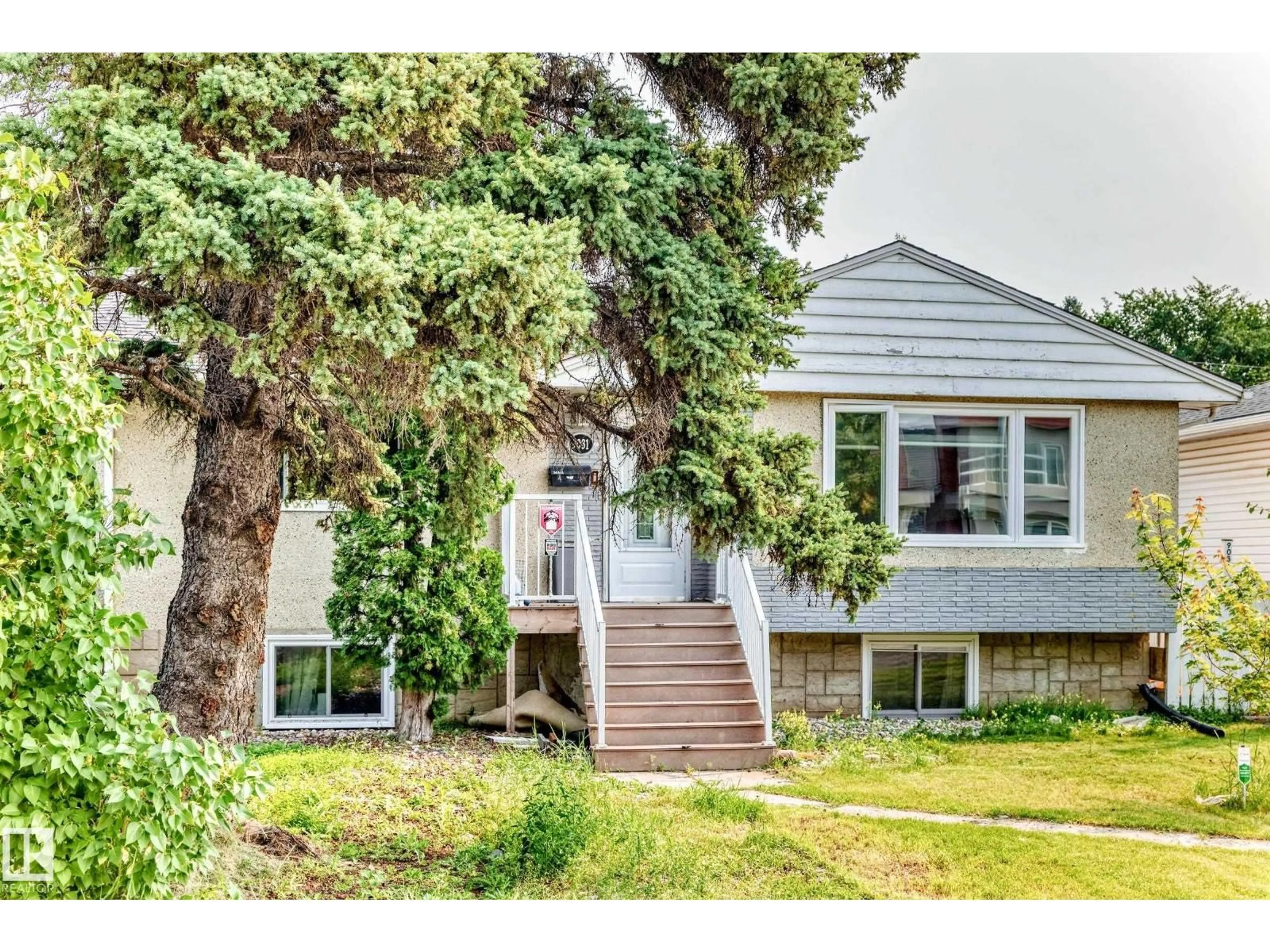 Home with vinyl exterior material, street for 9031 150 ST, Edmonton Alberta T5R1E8