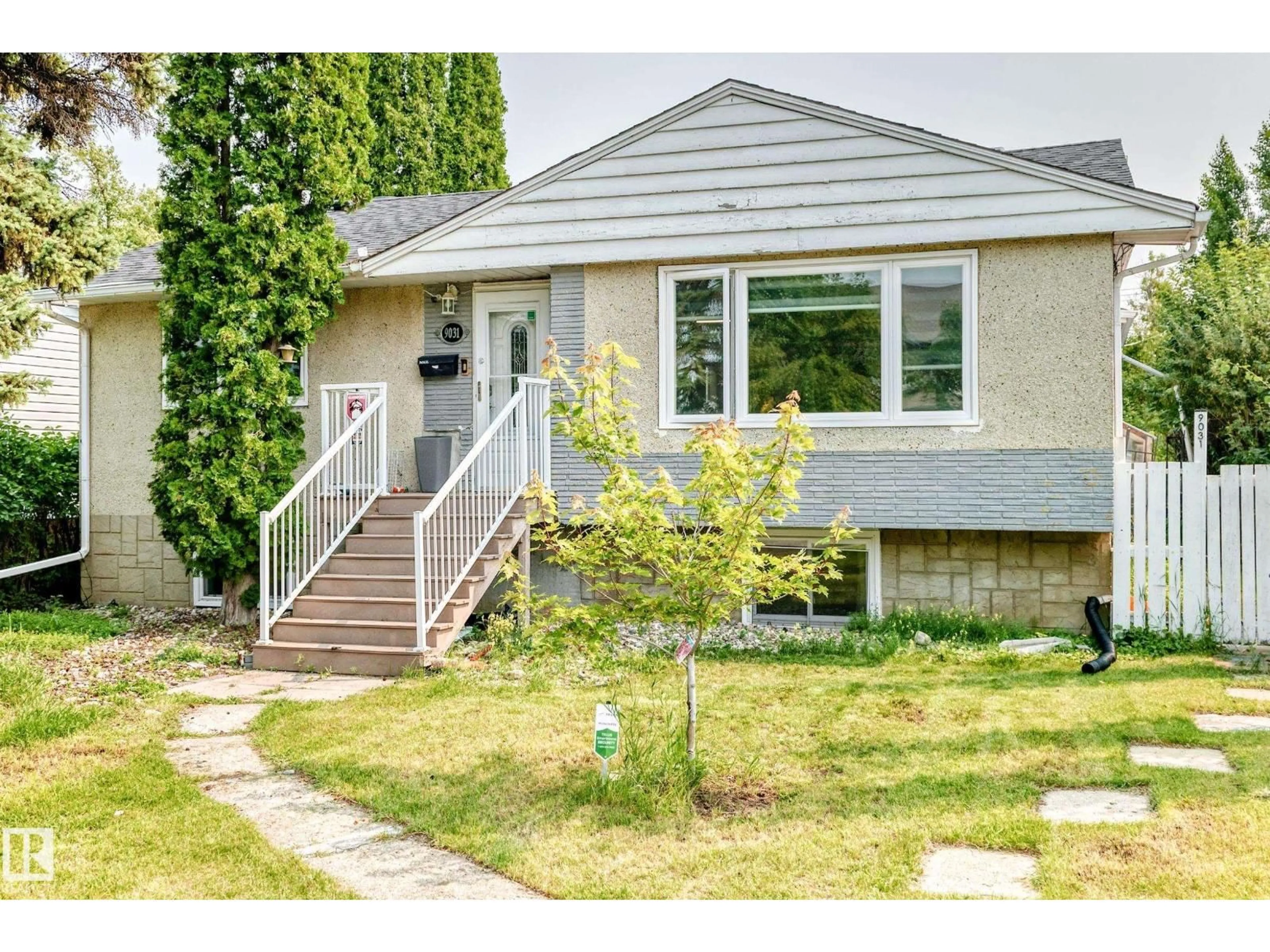 Home with vinyl exterior material, street for 9031 150 ST, Edmonton Alberta T5R1E8