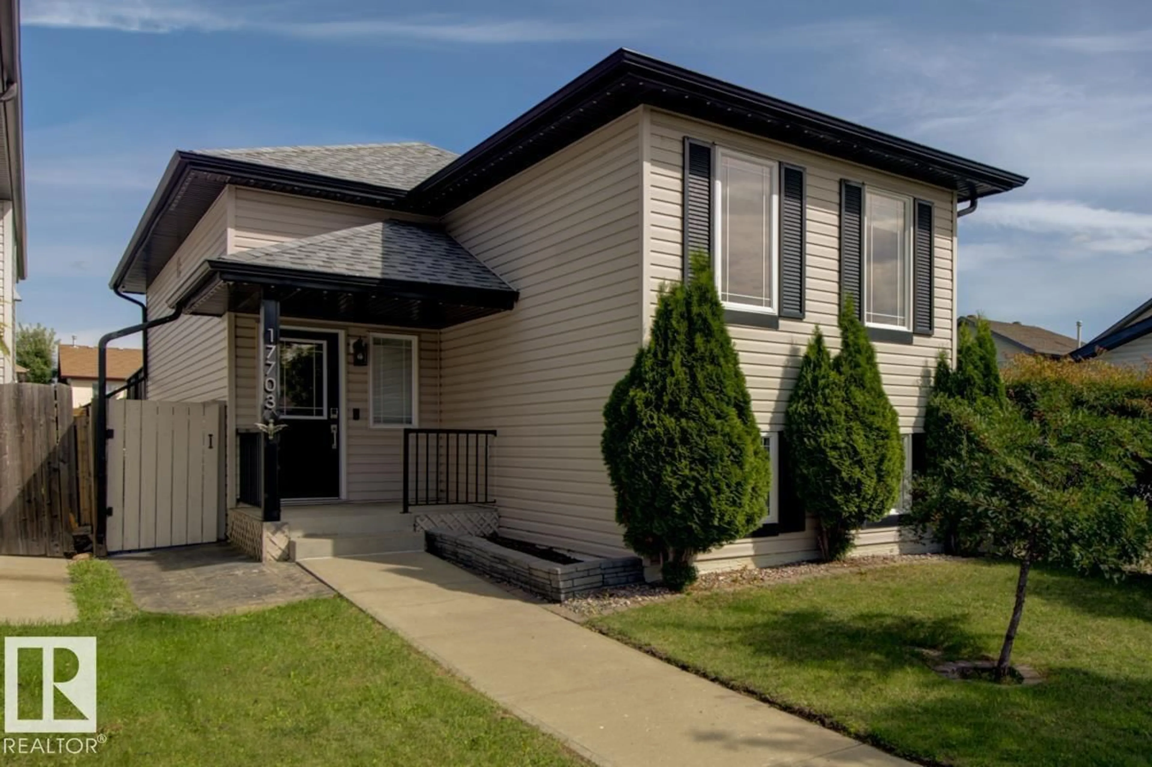 Home with vinyl exterior material, street for 17703 90 ST, Edmonton Alberta T5Z0A2