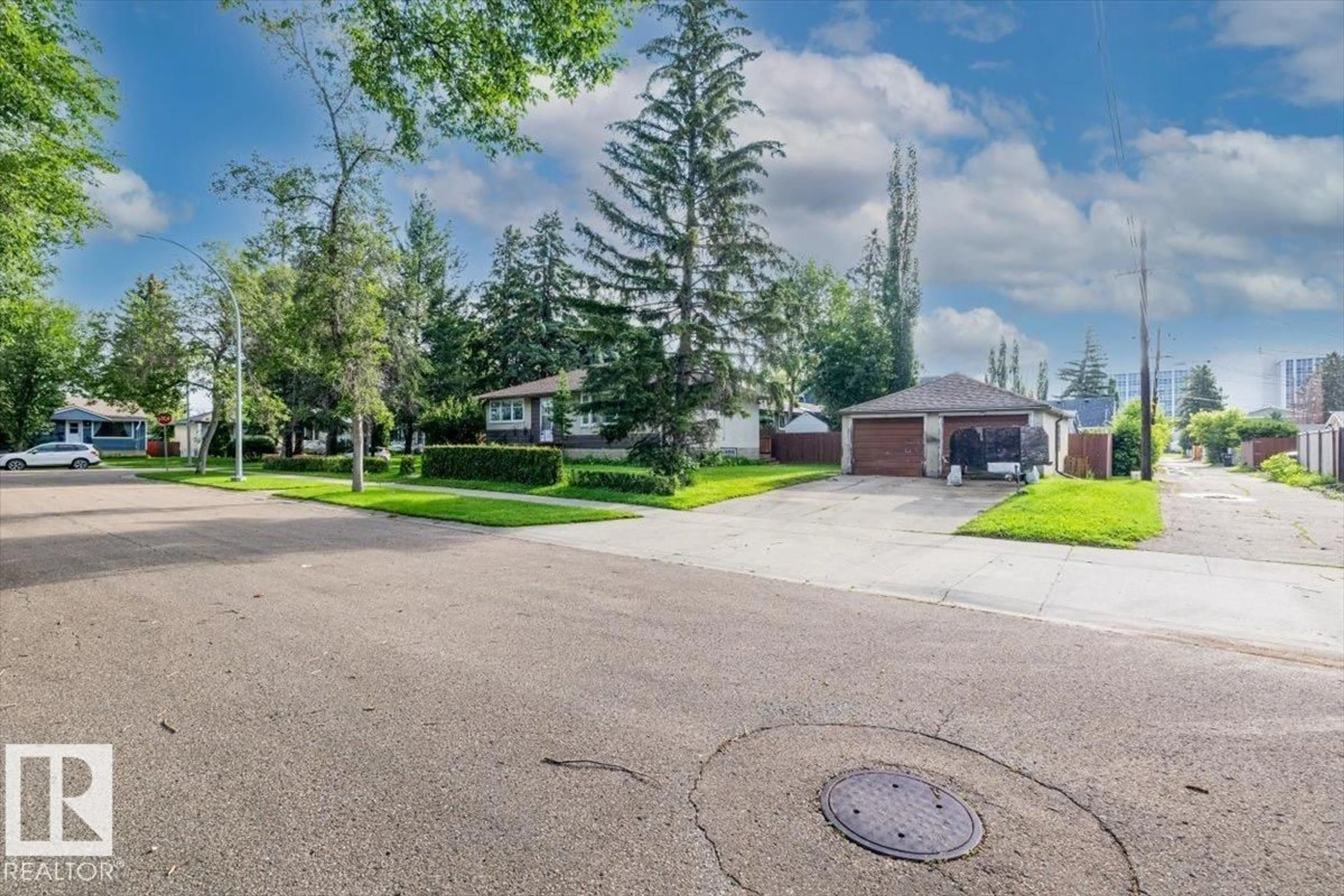 A pic from outside/outdoor area/front of a property/back of a property/a pic from drone, street for 11049 145 ST, Edmonton Alberta T5N2Y7