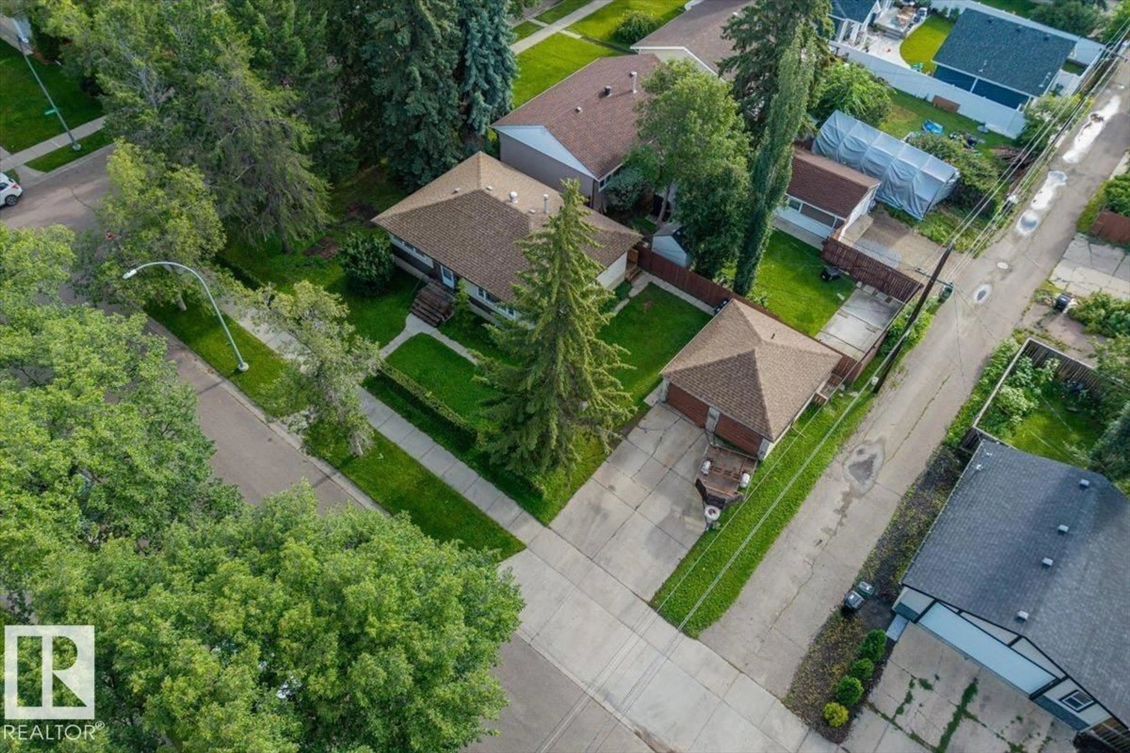 A pic from outside/outdoor area/front of a property/back of a property/a pic from drone, street for 11049 145 ST, Edmonton Alberta T5N2Y7