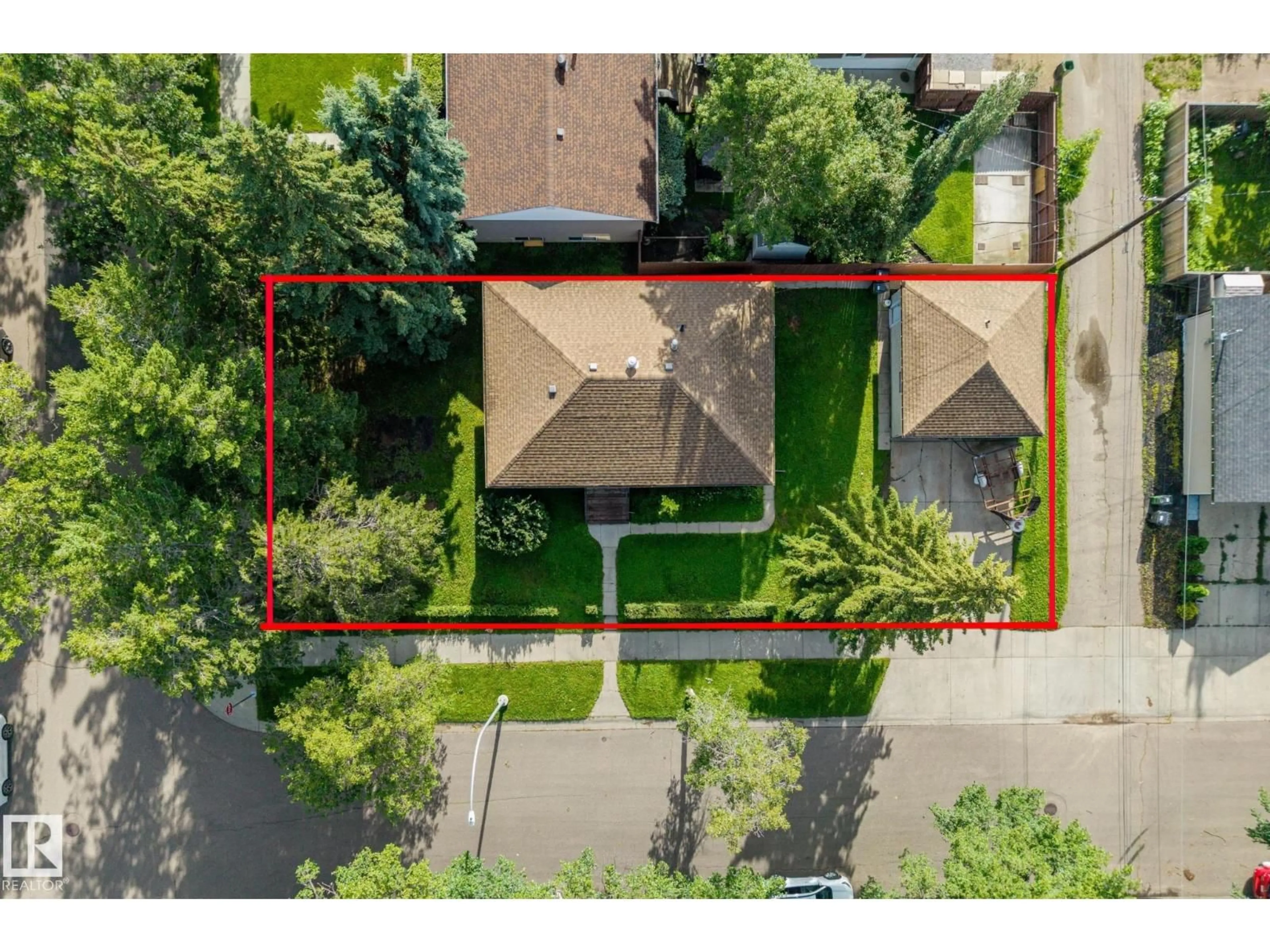 A pic from outside/outdoor area/front of a property/back of a property/a pic from drone, street for 11049 145 ST, Edmonton Alberta T5N2Y7