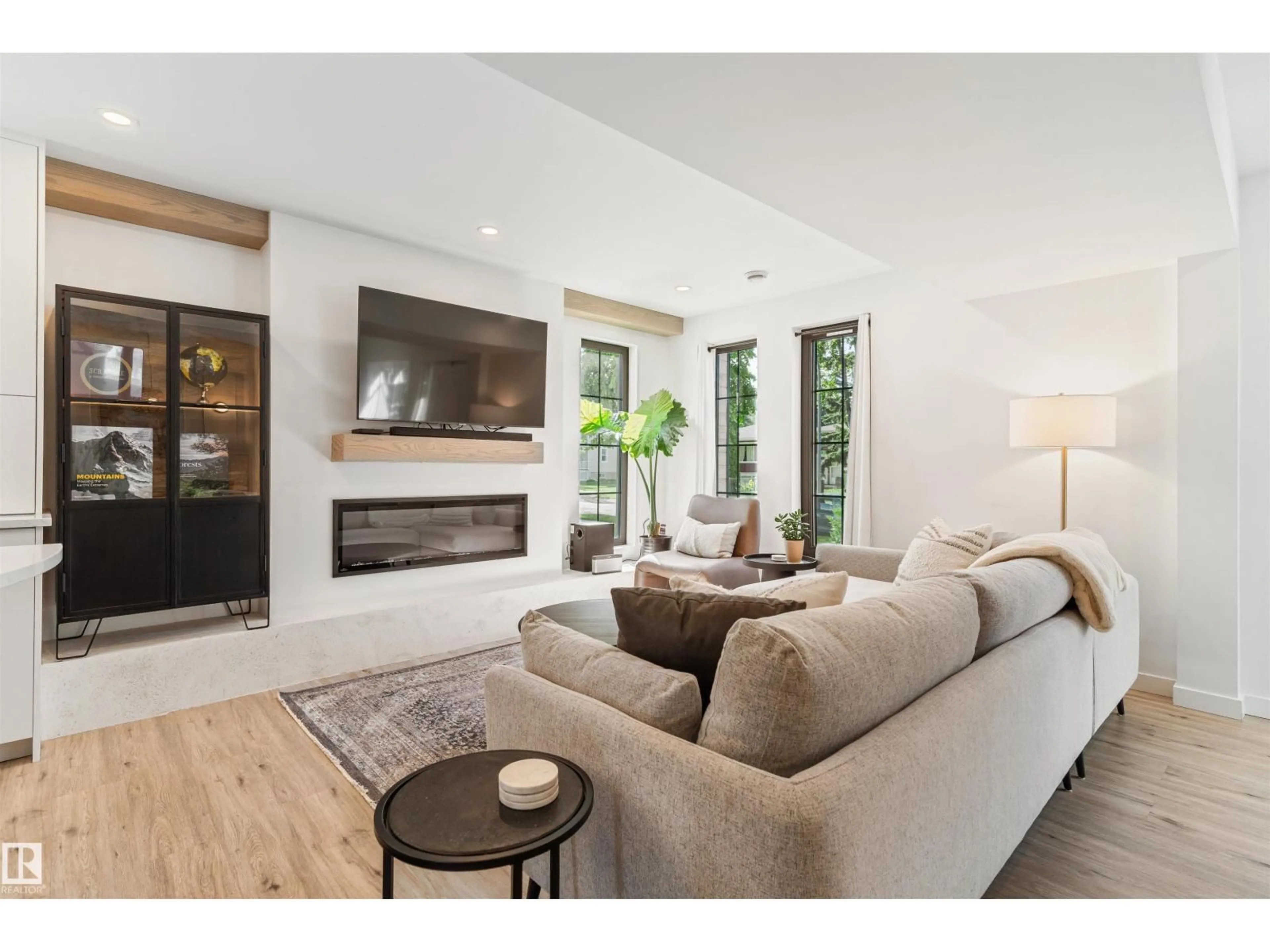 Living room with furniture, wood/laminate floor for 9342 74 AV, Edmonton Alberta T6E1E2