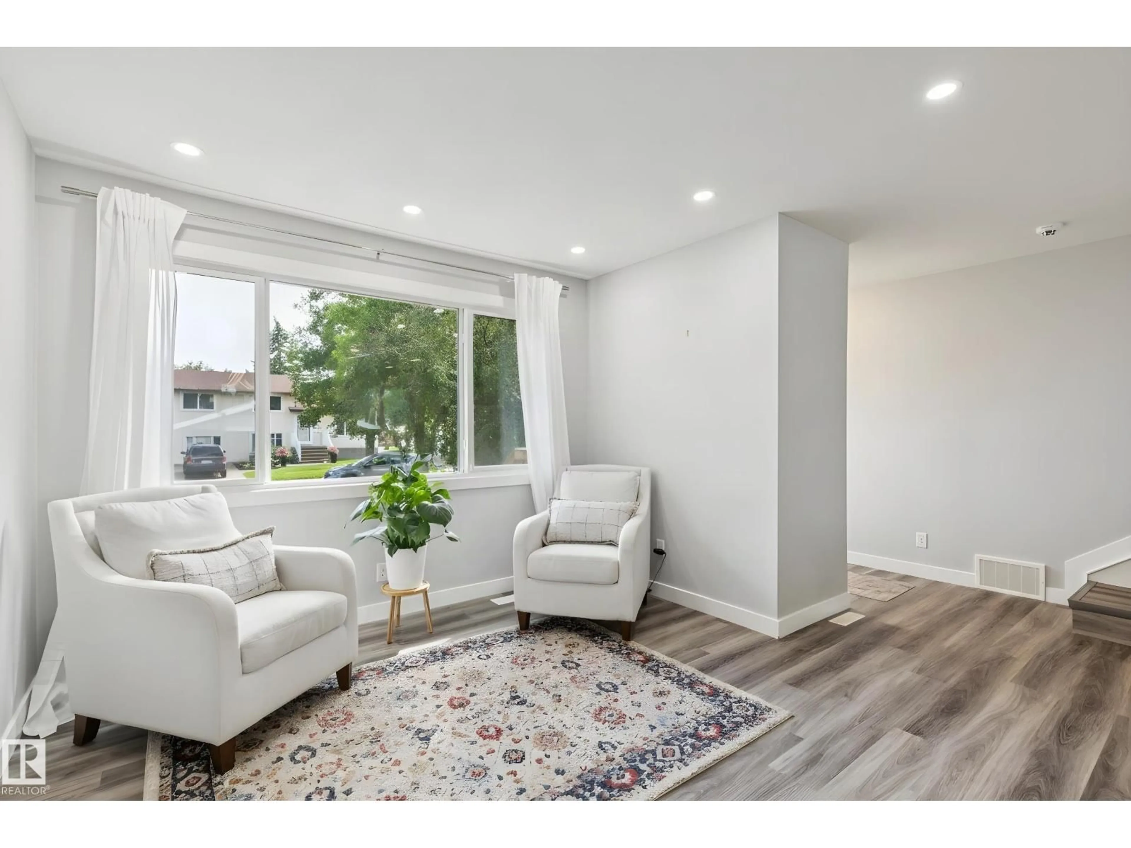 Living room with furniture, unknown for 13428 117A AV, Edmonton Alberta T5M3J7