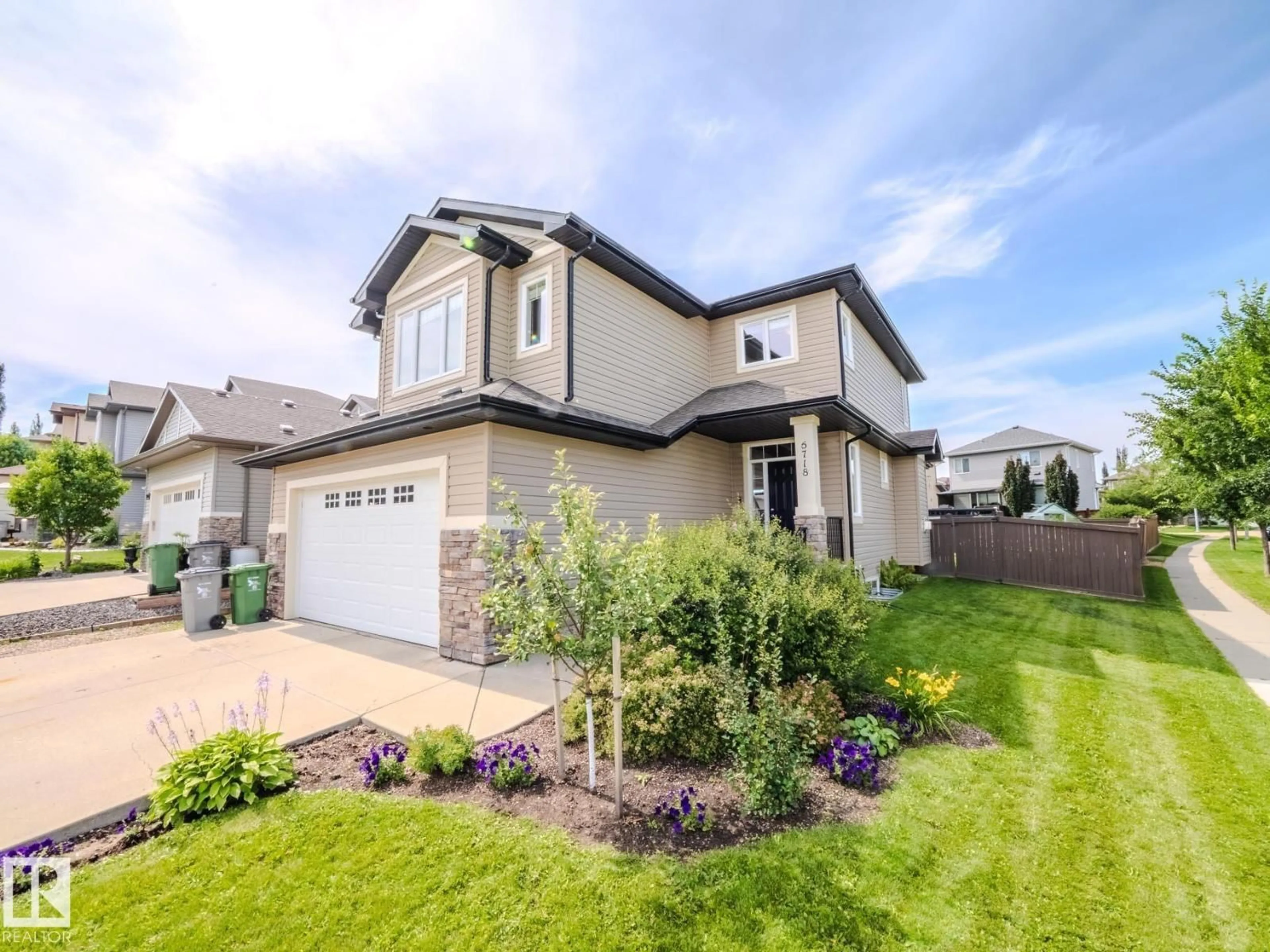 Home with vinyl exterior material, street for 5718 42 ST, Beaumont Alberta T4X0C2