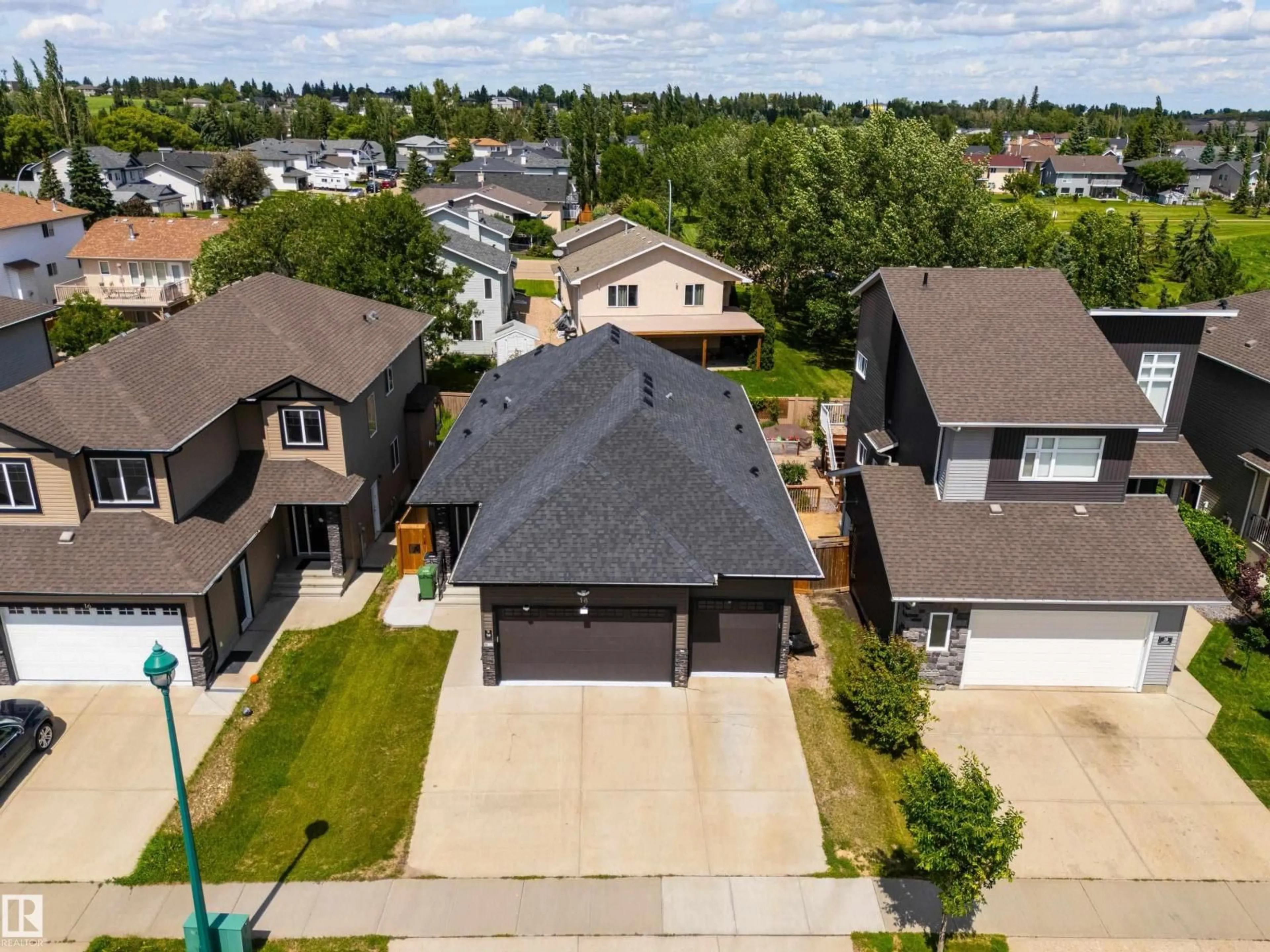 A pic from outside/outdoor area/front of a property/back of a property/a pic from drone, street for 18 LAKEVISTA PT, Beaumont Alberta T4X0J2