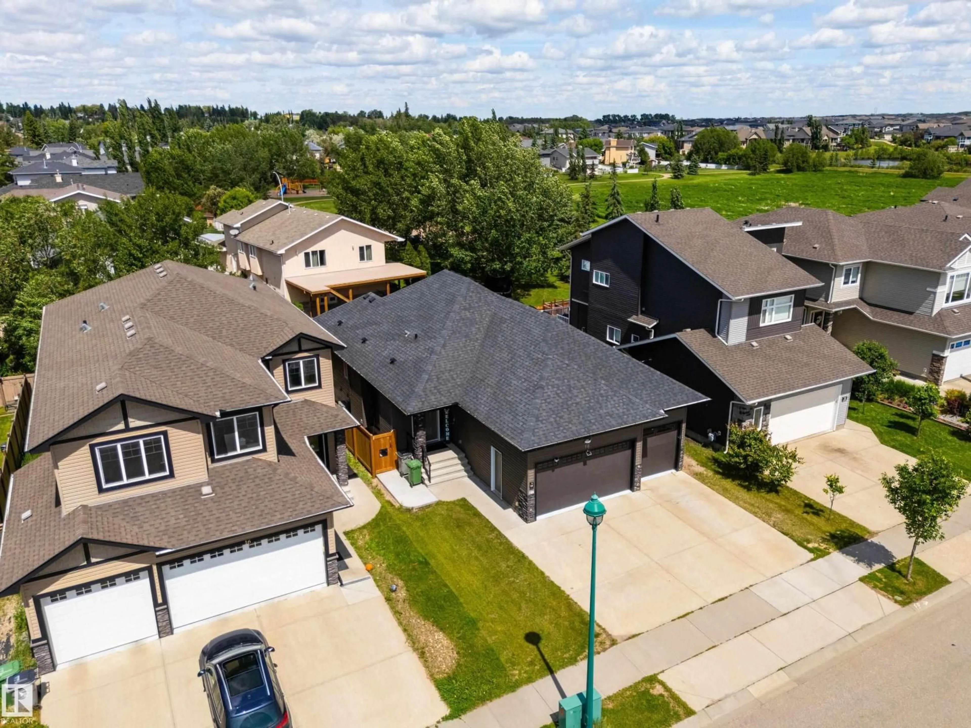 A pic from outside/outdoor area/front of a property/back of a property/a pic from drone, street for 18 LAKEVISTA PT, Beaumont Alberta T4X0J2