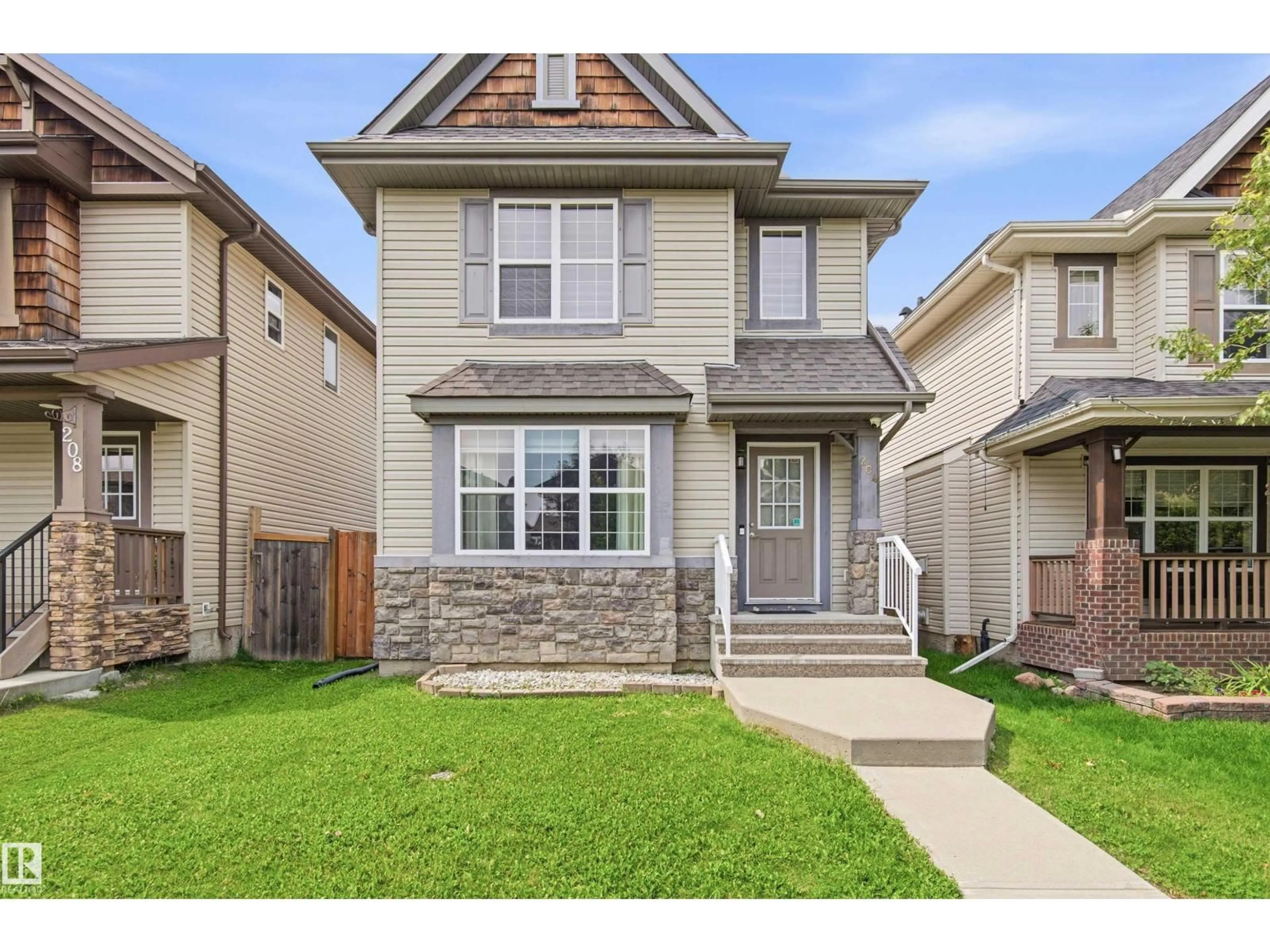 Home with vinyl exterior material, street for 204 59 ST, Edmonton Alberta T6X0E9