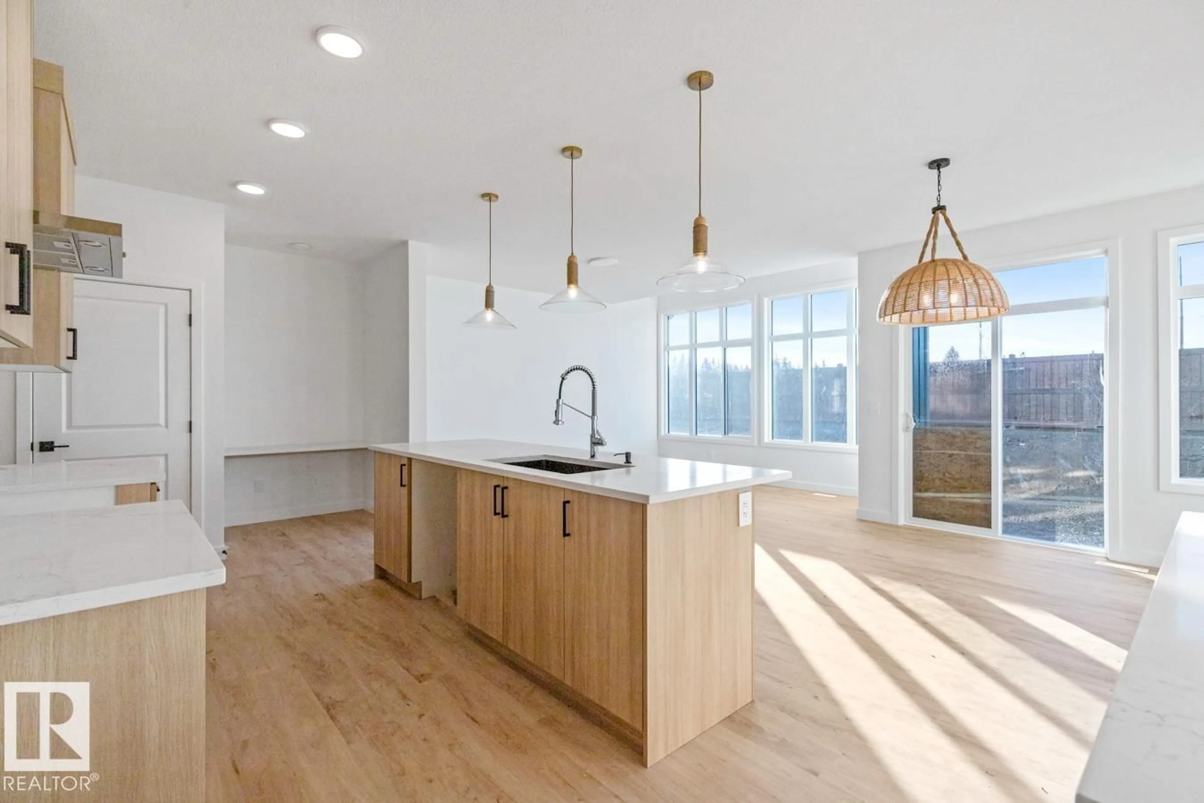 Open concept kitchen, wood/laminate floor for 62 CUDDIE DR, Sherwood Park Alberta T8H3C8
