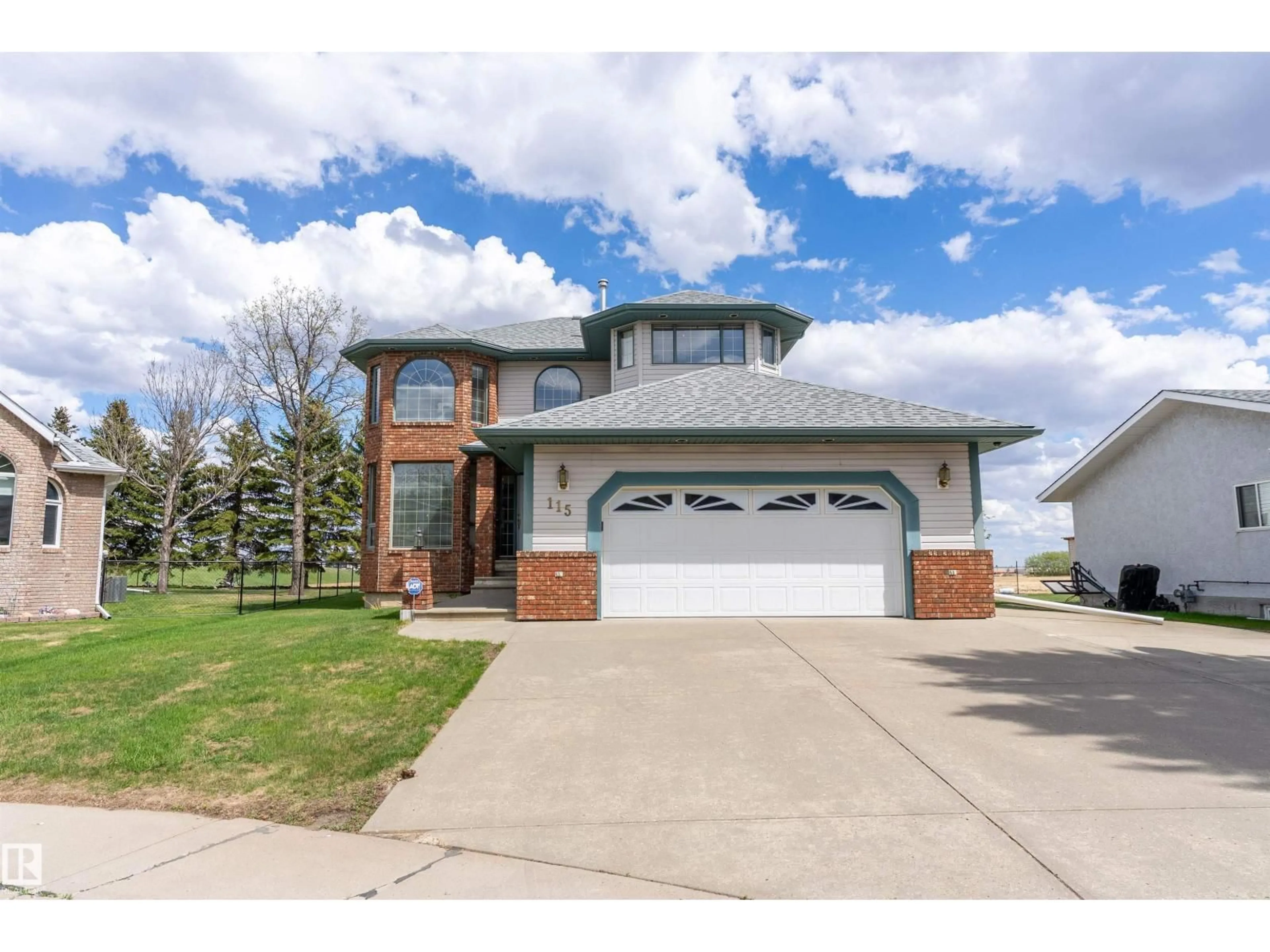 Home with brick exterior material, street for 115 ASPEN RIDGE CR, Wetaskiwin Alberta T9A3N7