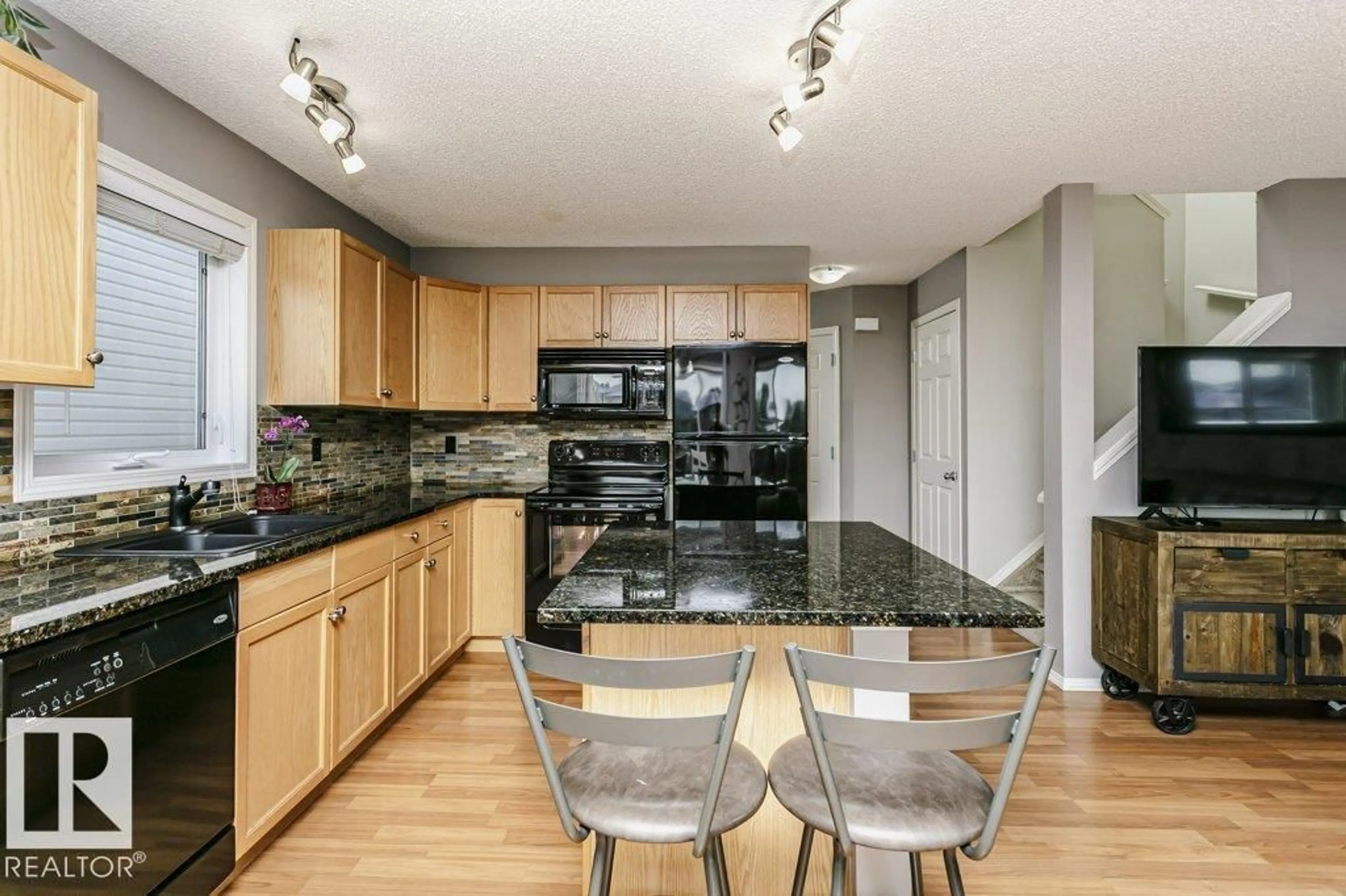 Open concept kitchen, unknown for 5943 164 AV, Edmonton Alberta T5Y0B2