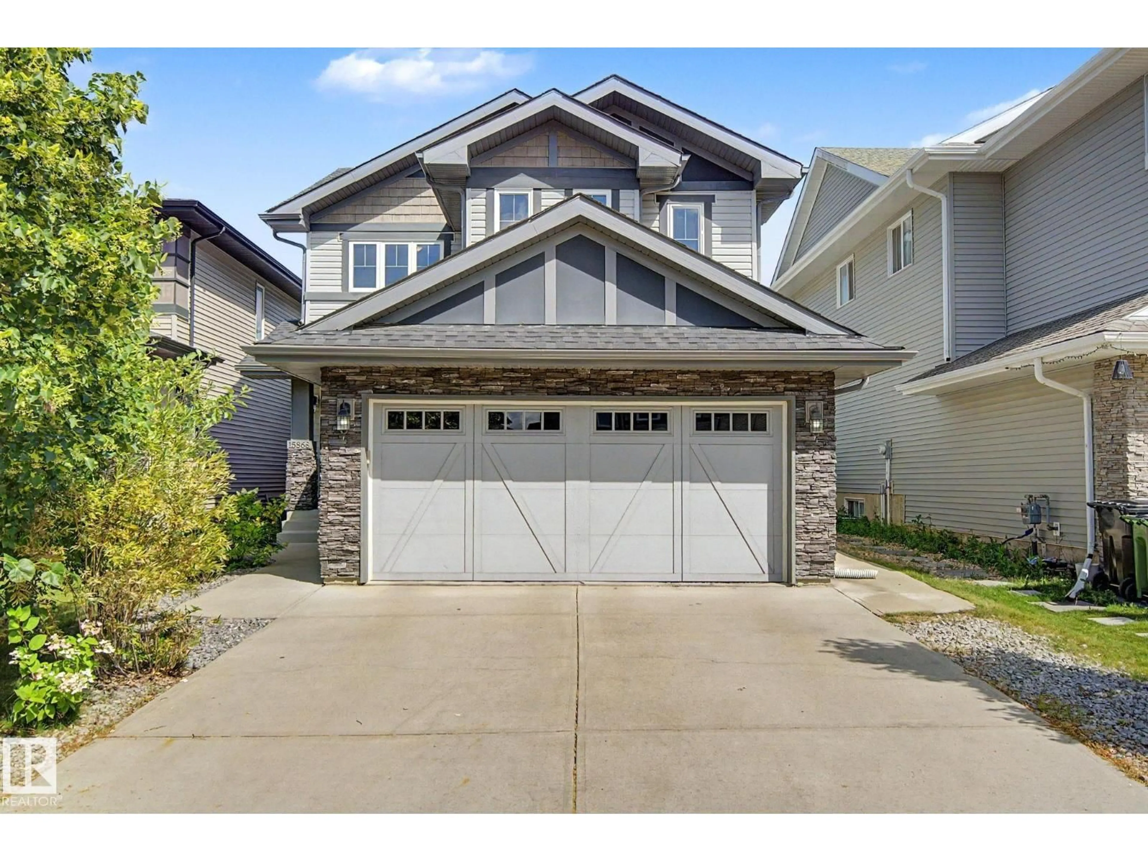 Home with vinyl exterior material, street for SW - 15868 10 AV, Edmonton Alberta T6W2H2