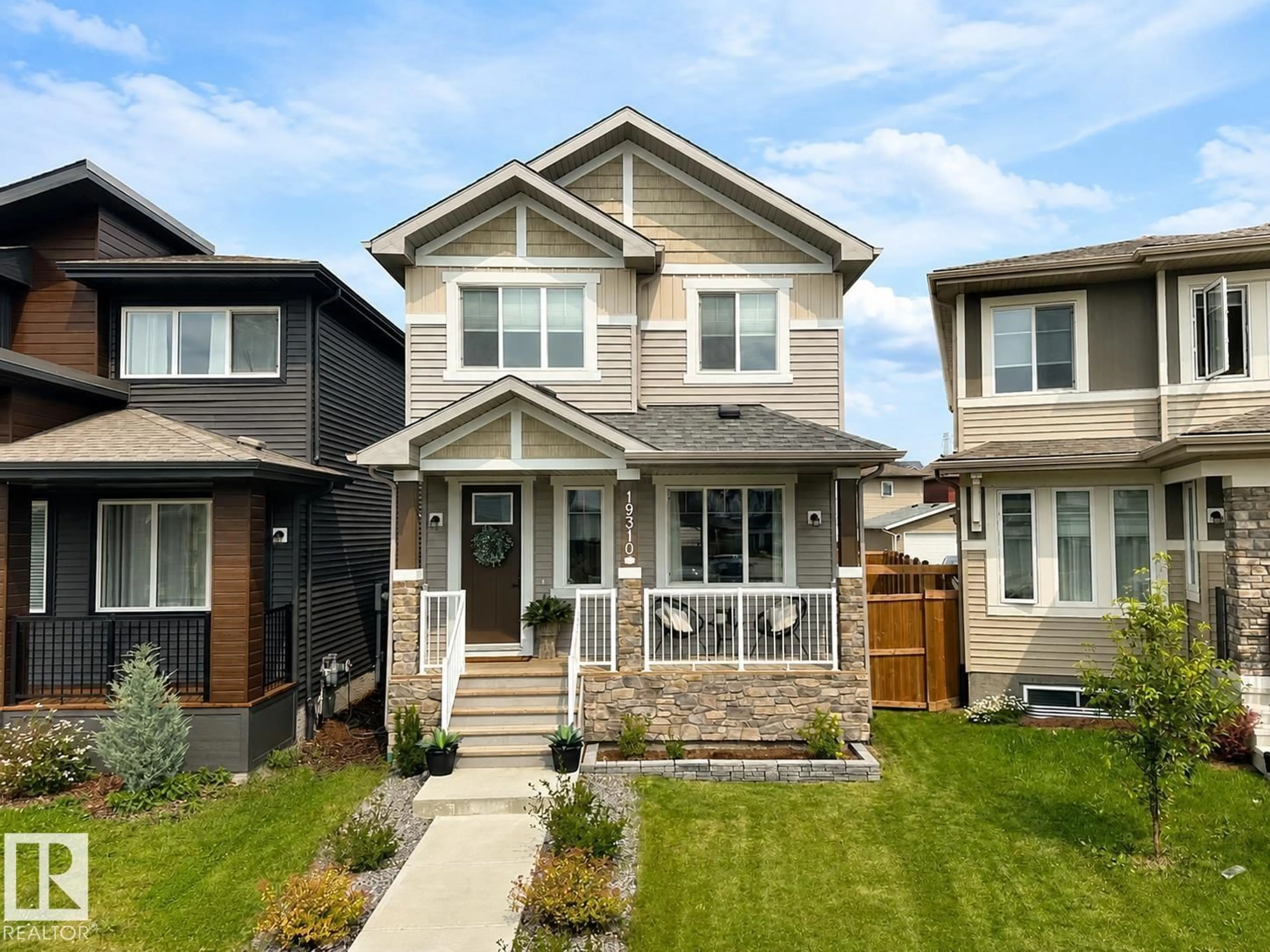 Home with brick exterior material, street for 19310 26A AVE, Edmonton Alberta T6M1L2