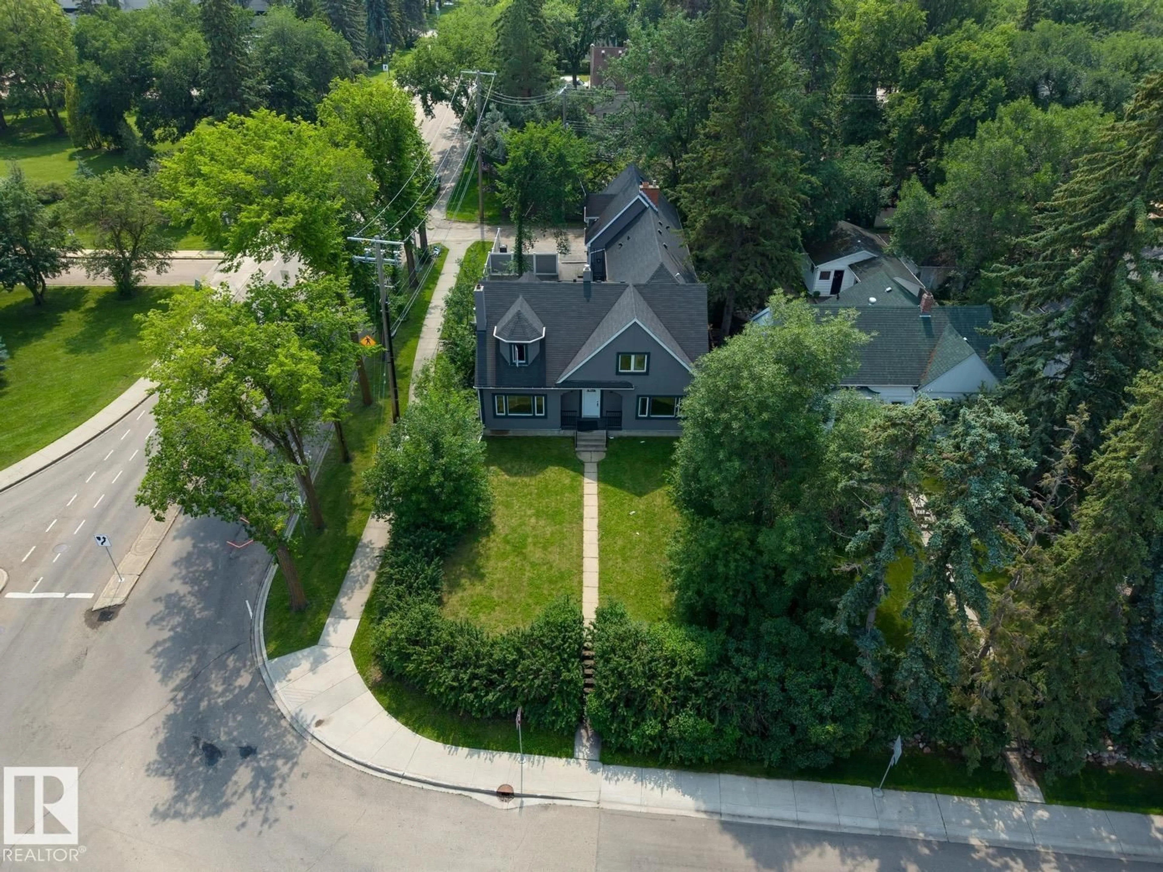 A pic from outside/outdoor area/front of a property/back of a property/a pic from drone, street for 11603 SASKATCHEWAN DR, Edmonton Alberta T6G2B5