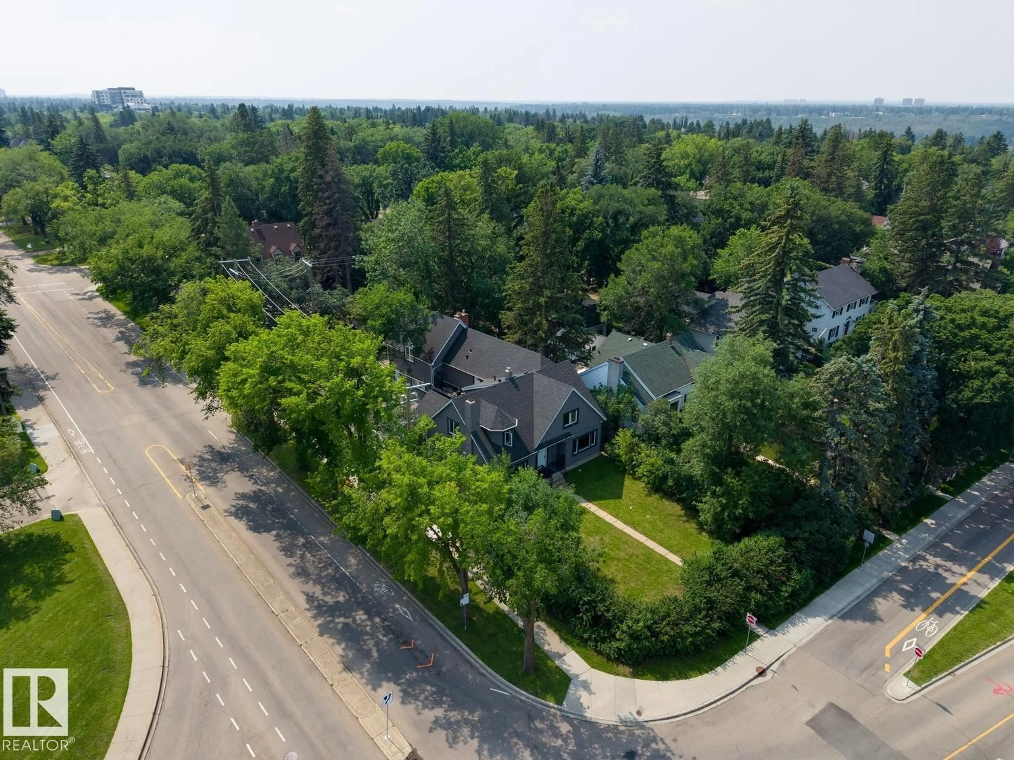 A pic from outside/outdoor area/front of a property/back of a property/a pic from drone, street for 11603 SASKATCHEWAN DR, Edmonton Alberta T6G2B5